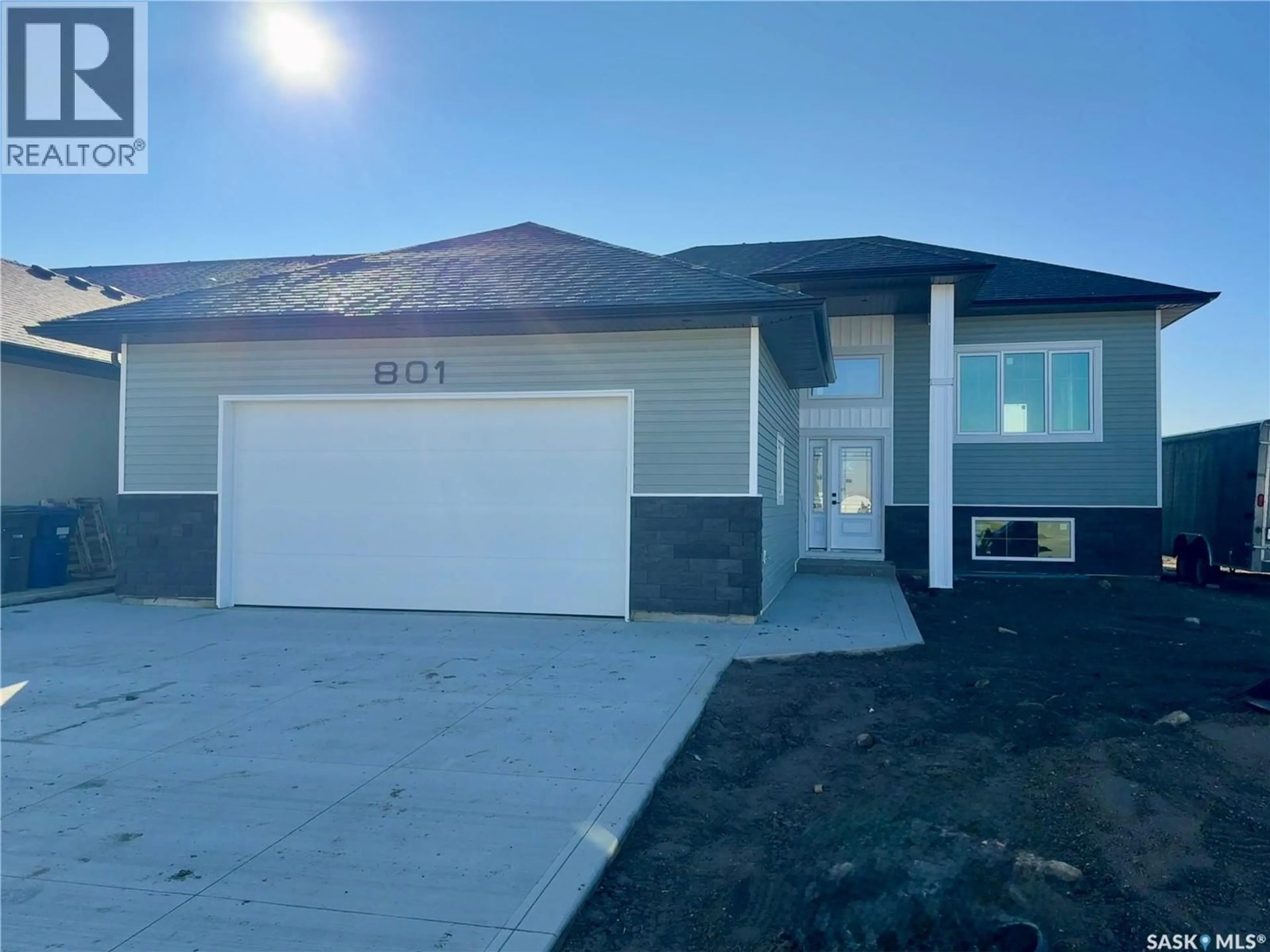 Home with vinyl exterior material, street for 801 WEIR CRESCENT, Warman Saskatchewan S0K4S4