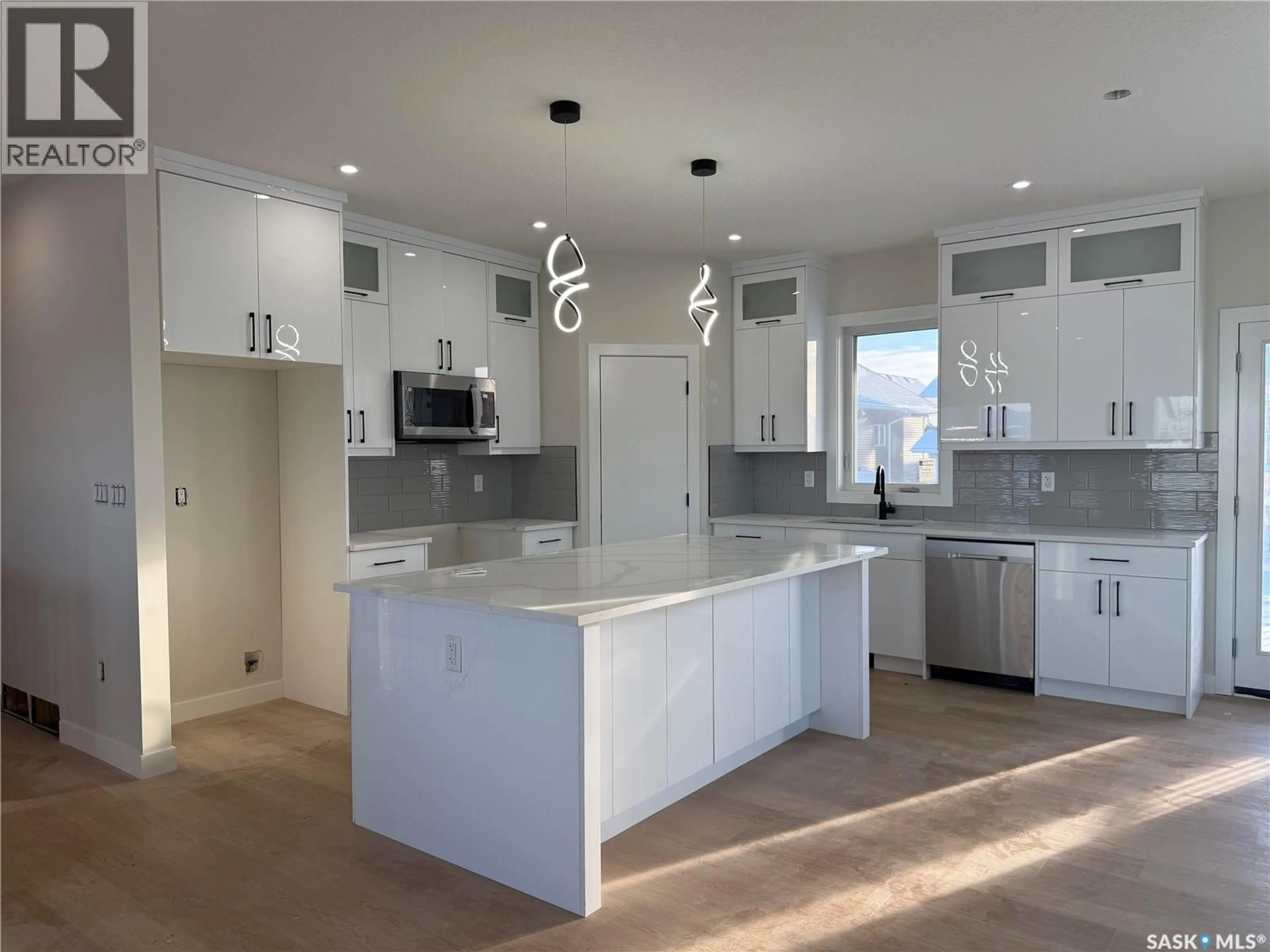 Open concept kitchen, ceramic/tile floor for 801 WEIR CRESCENT, Warman Saskatchewan S0K4S4