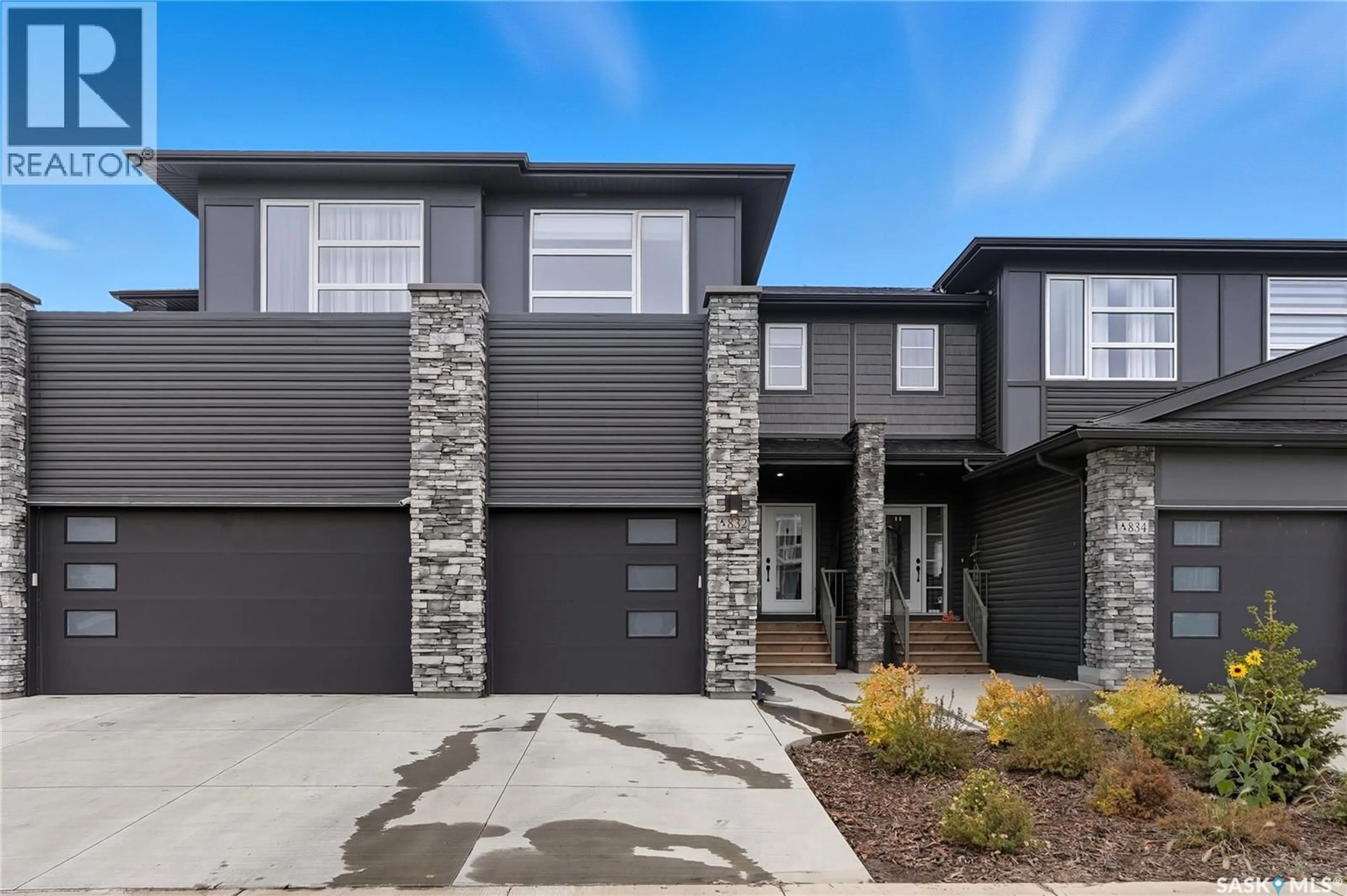 Home with brick exterior material, street for 832 BRIGHTON GATE, Saskatoon Saskatchewan S7V1L3