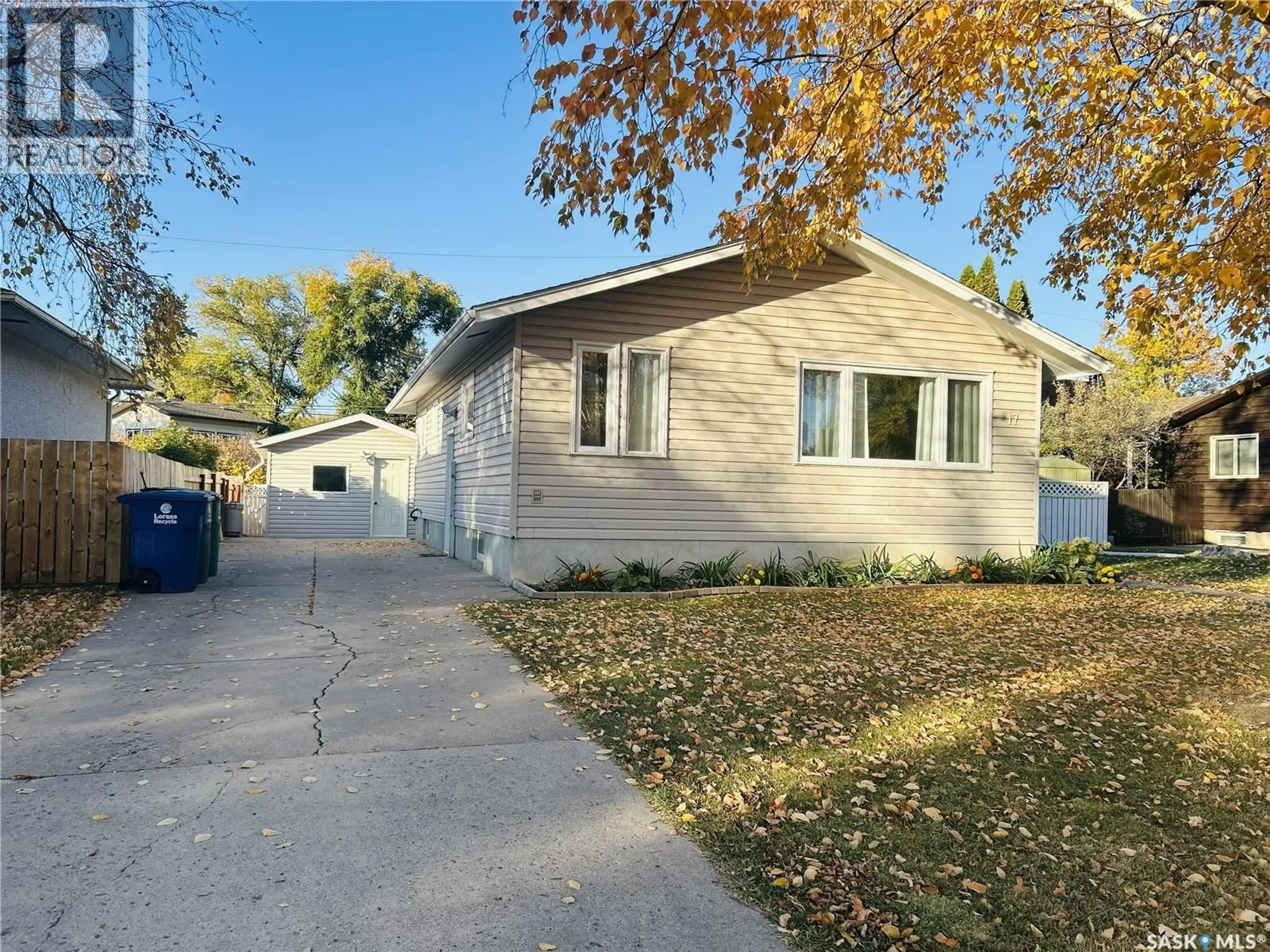 Home with vinyl exterior material, street for 17 MITCHELL STREET, Saskatoon Saskatchewan S7H3E9