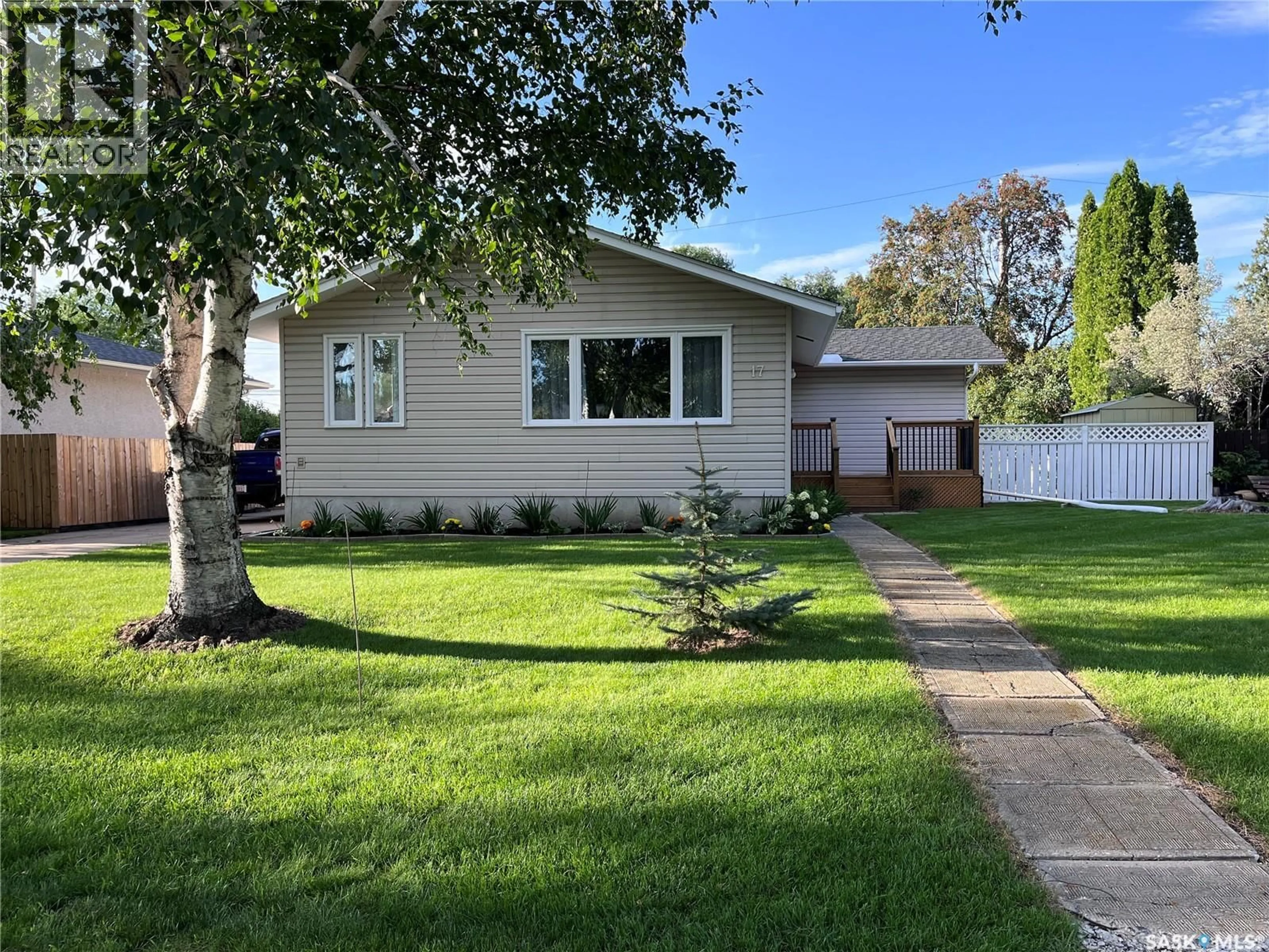 Home with vinyl exterior material, street for 17 MITCHELL STREET, Saskatoon Saskatchewan S7H3E9