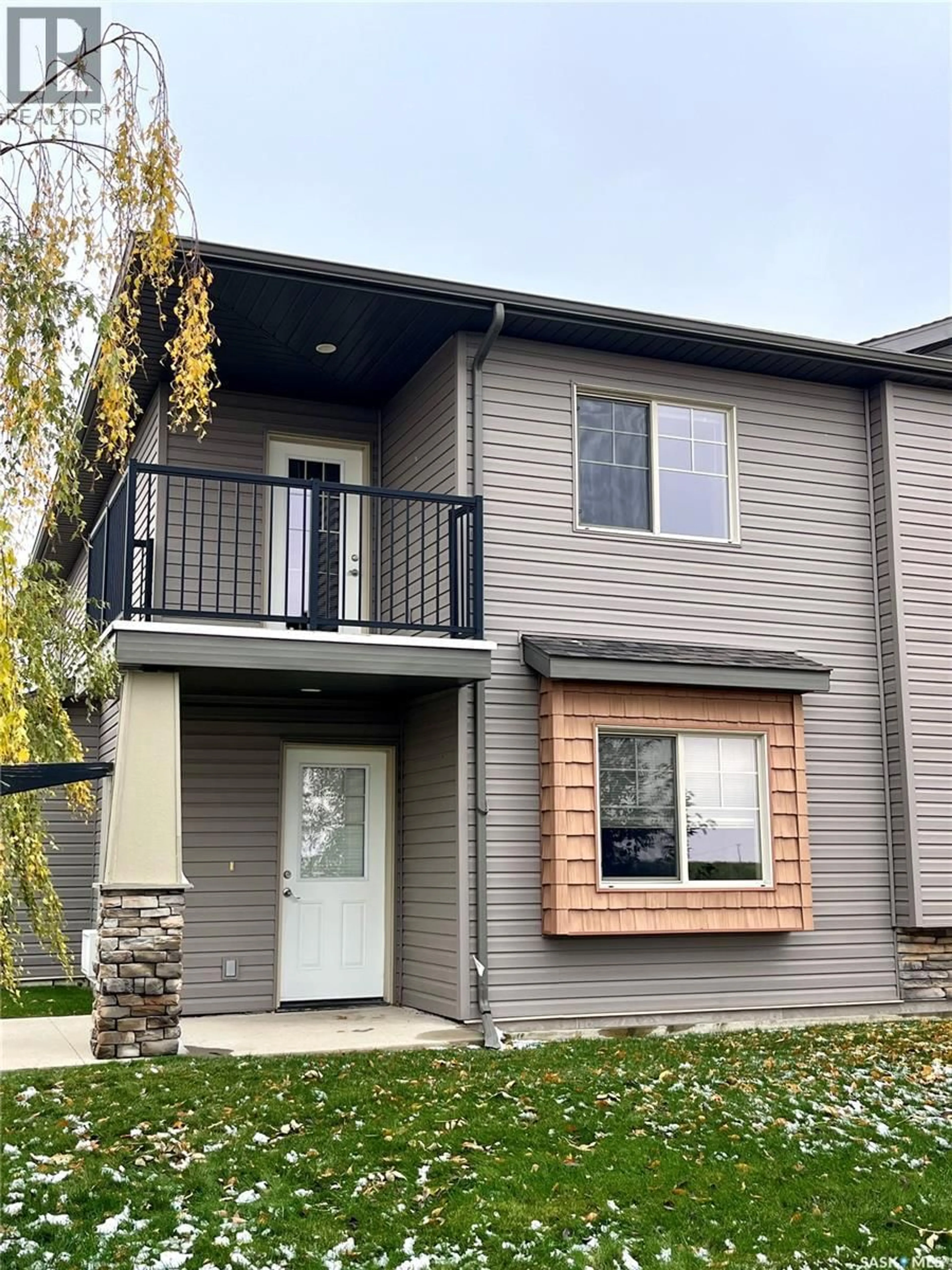 Home with vinyl exterior material, street for 700 - 521 BATTLEFORD TRAIL, Swift Current Saskatchewan S9H4V9