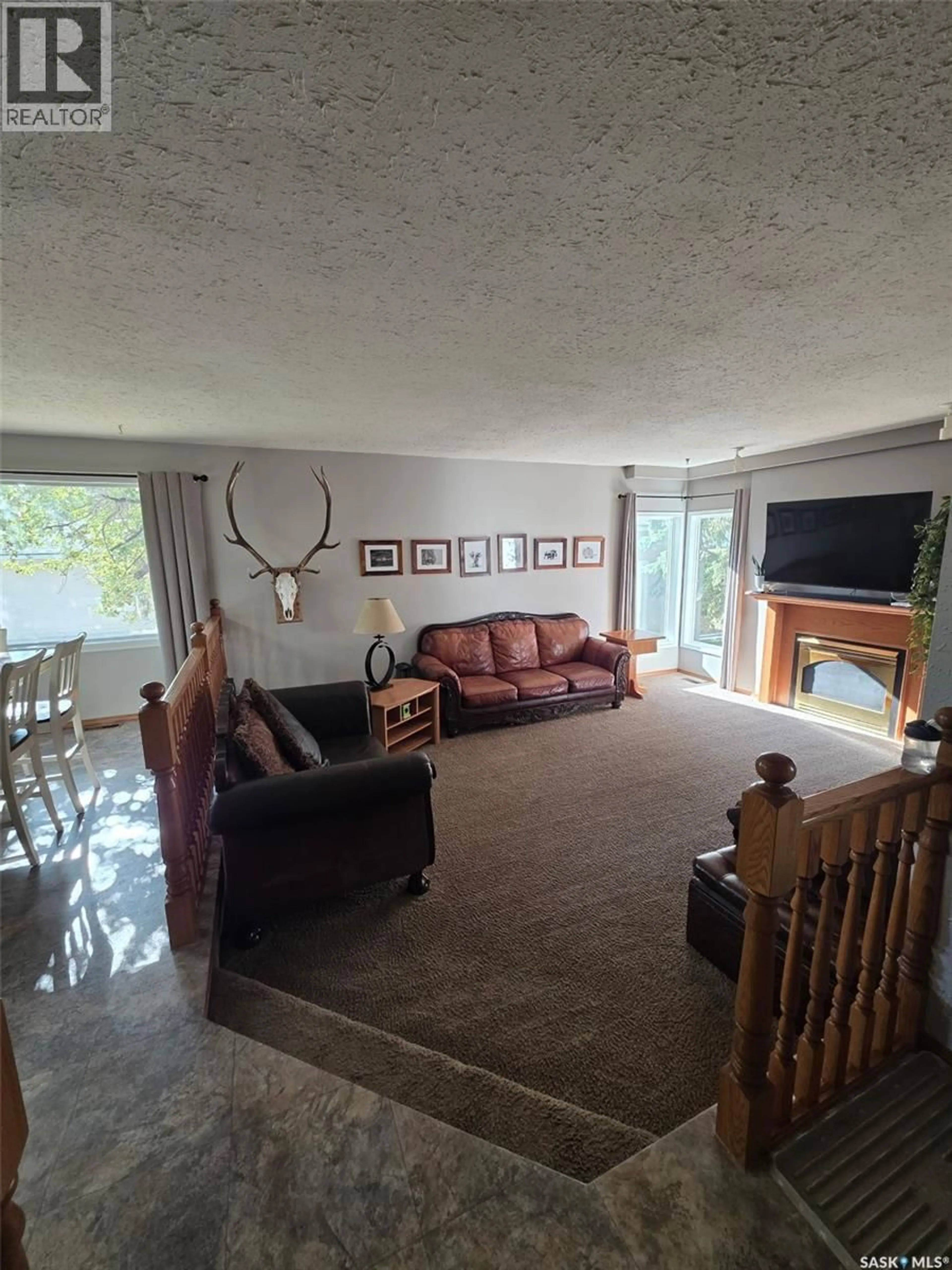 Living room with furniture, unknown for 402 BROAD STREET, Cut Knife Saskatchewan S0M0N0