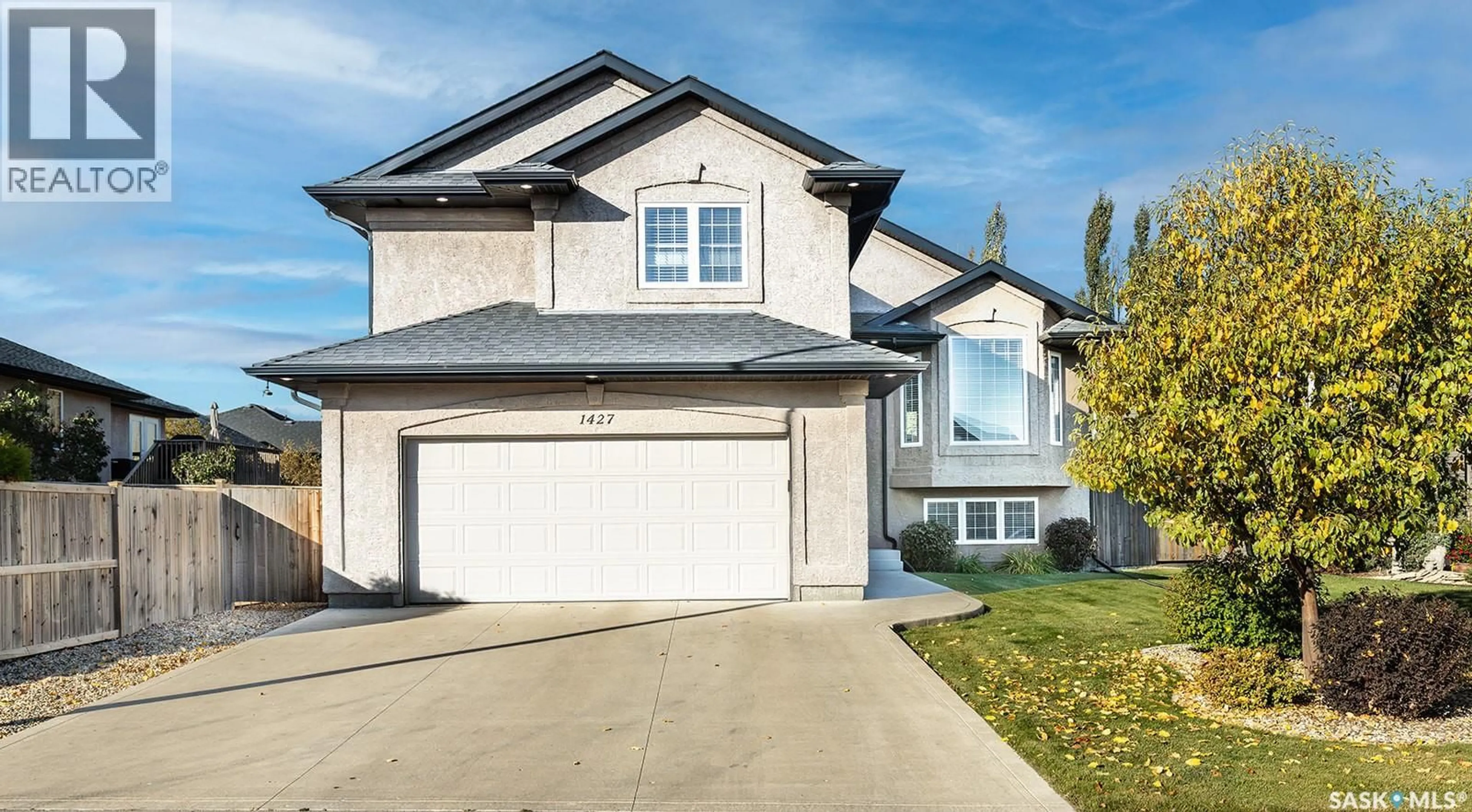 Home with vinyl exterior material, street for 1427 SHEPHERD LANE, Saskatoon Saskatchewan S7W0B3
