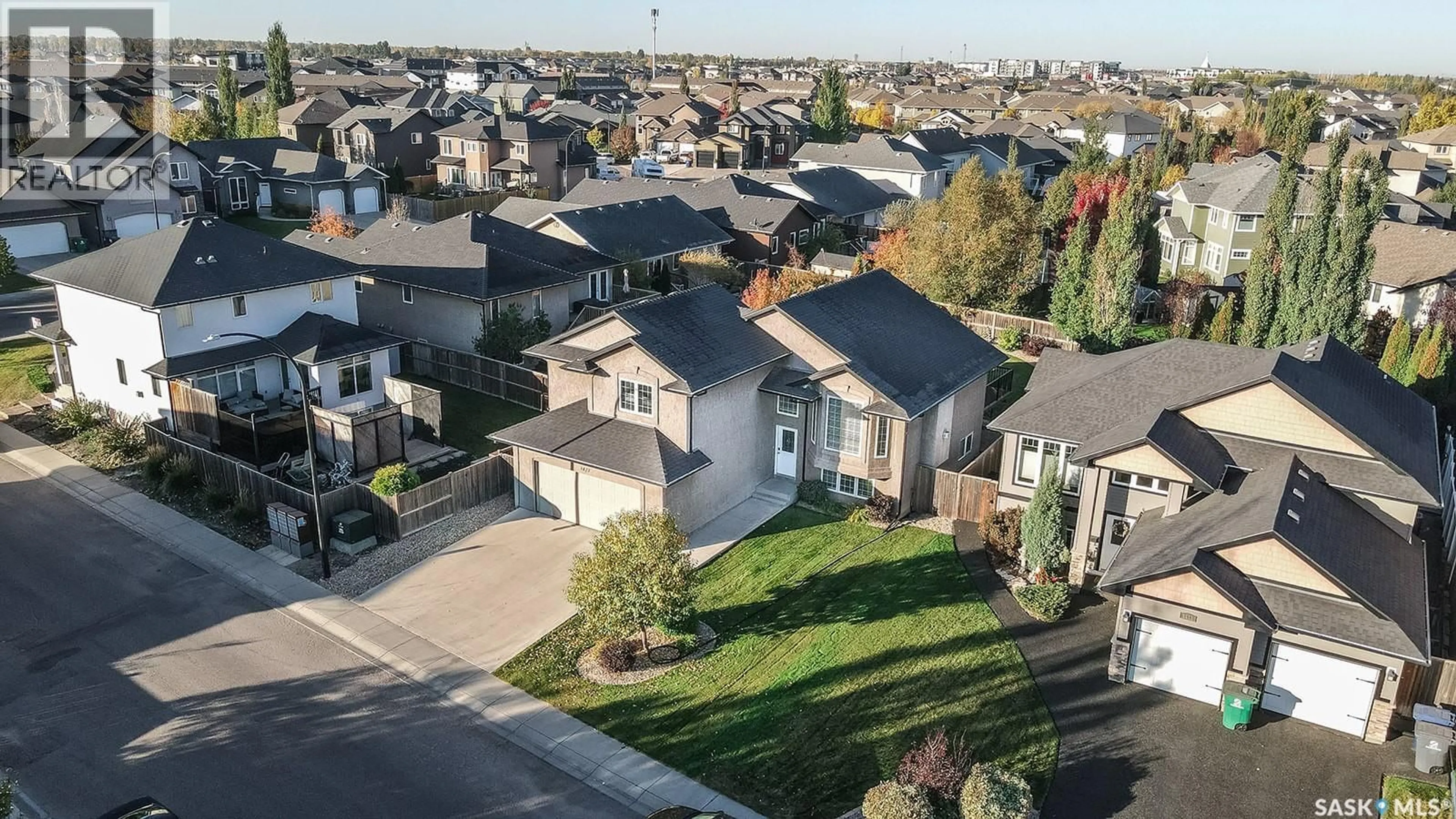A pic from outside/outdoor area/front of a property/back of a property/a pic from drone, street for 1427 SHEPHERD LANE, Saskatoon Saskatchewan S7W0B3