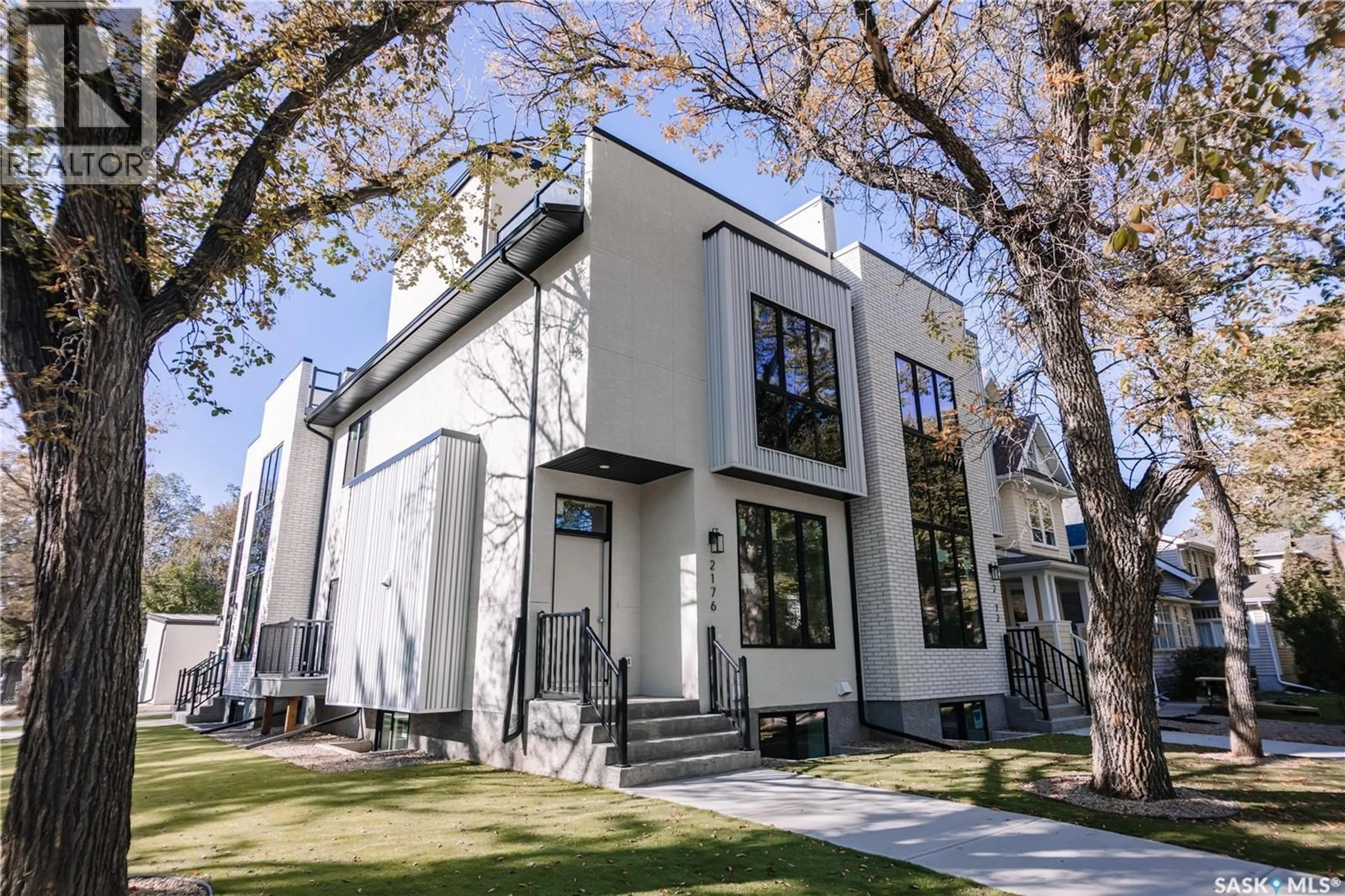 Home with vinyl exterior material, street for 2804 14TH AVENUE, Regina Saskatchewan S4T5S8