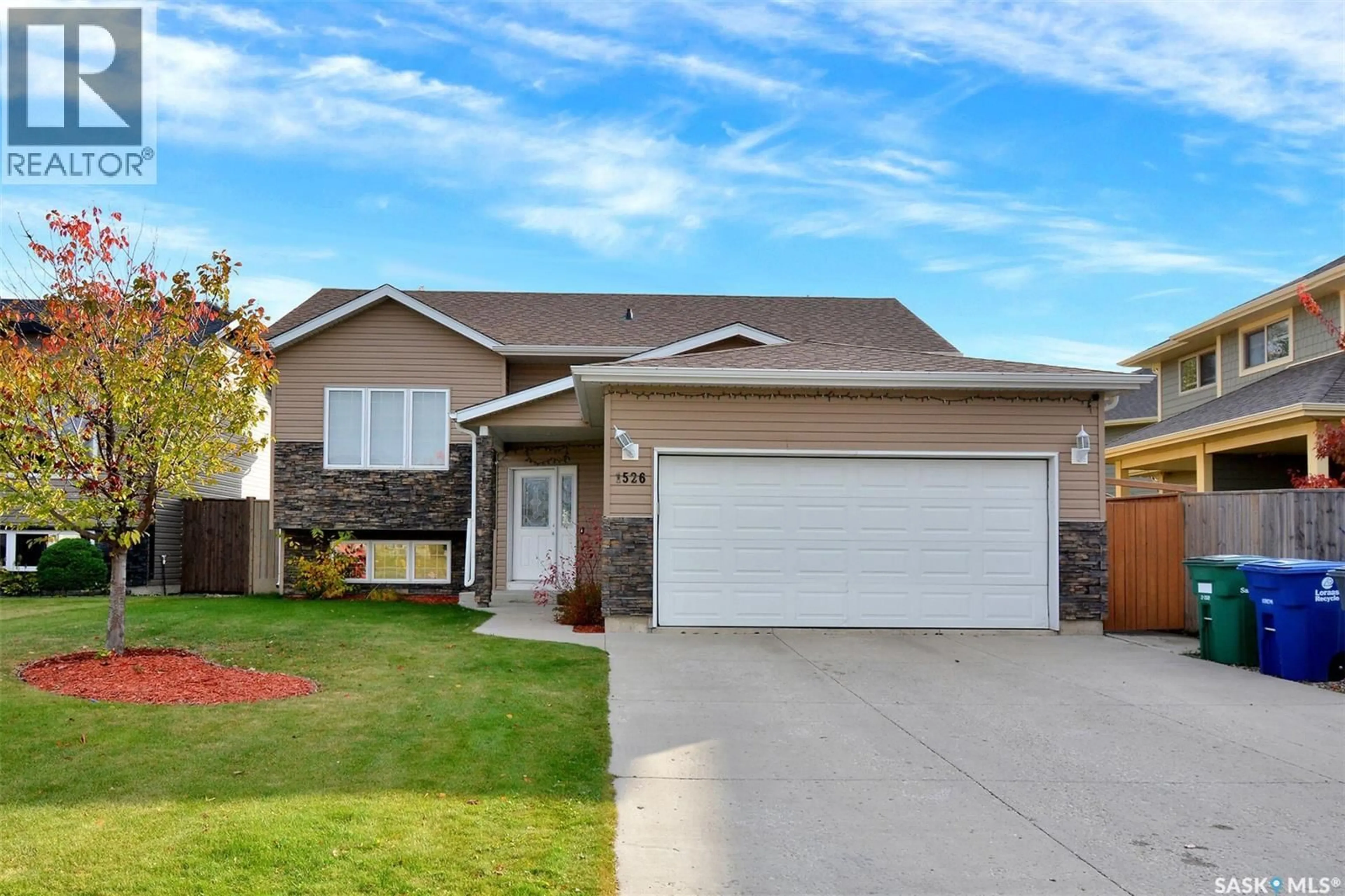 Home with vinyl exterior material, street for 1526 PATON CRESCENT, Saskatoon Saskatchewan S7W0C3