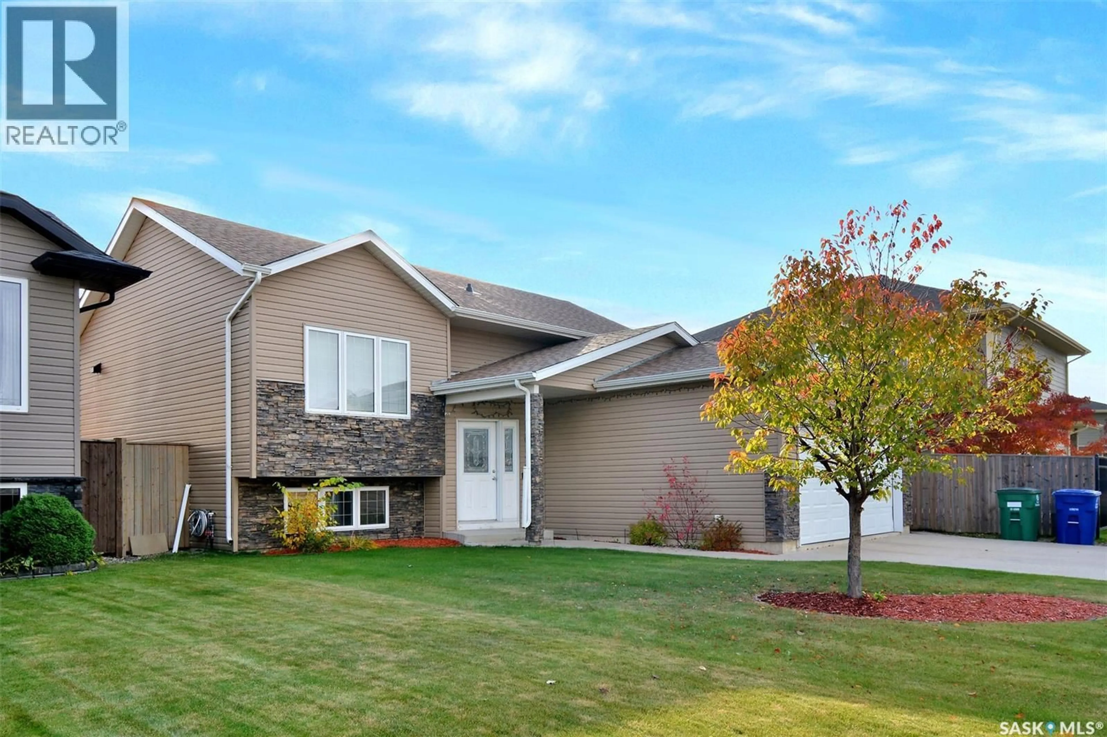 Home with vinyl exterior material, street for 1526 PATON CRESCENT, Saskatoon Saskatchewan S7W0C3