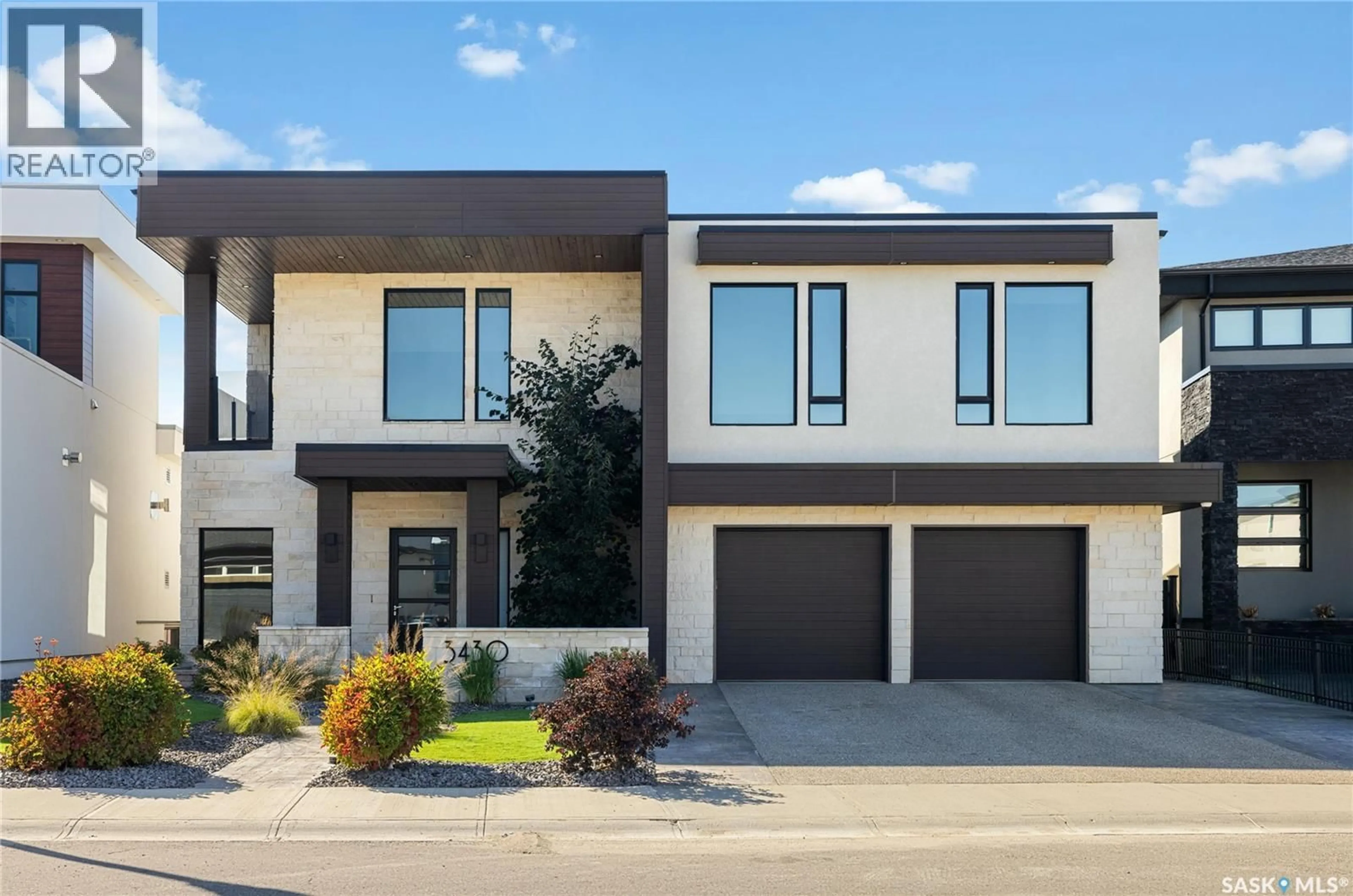 Home with vinyl exterior material, street for 3430 GREEN BROOK ROAD, Regina Saskatchewan S4V3K2
