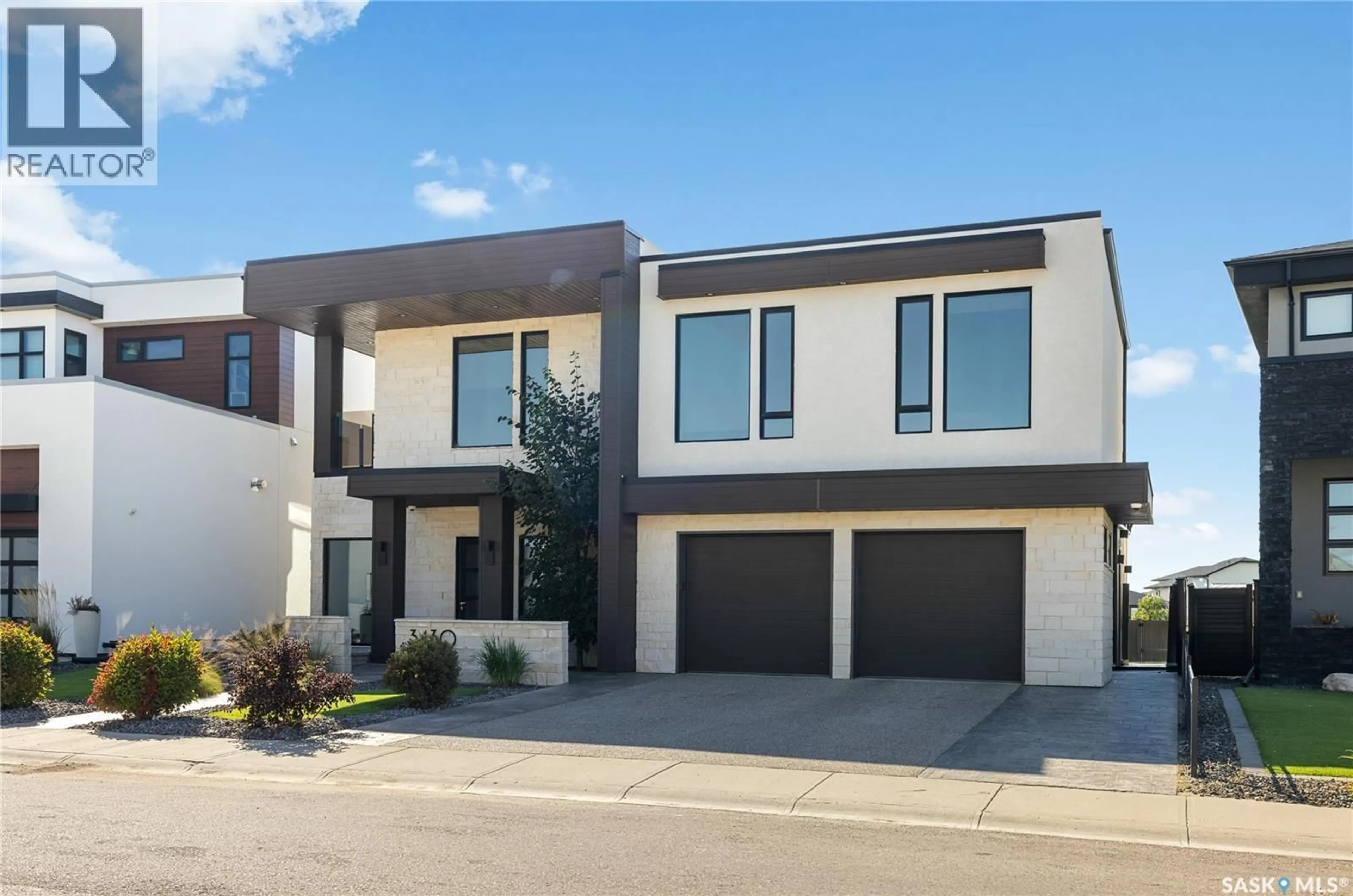 Home with brick exterior material, street for 3430 GREEN BROOK ROAD, Regina Saskatchewan S4V3K2