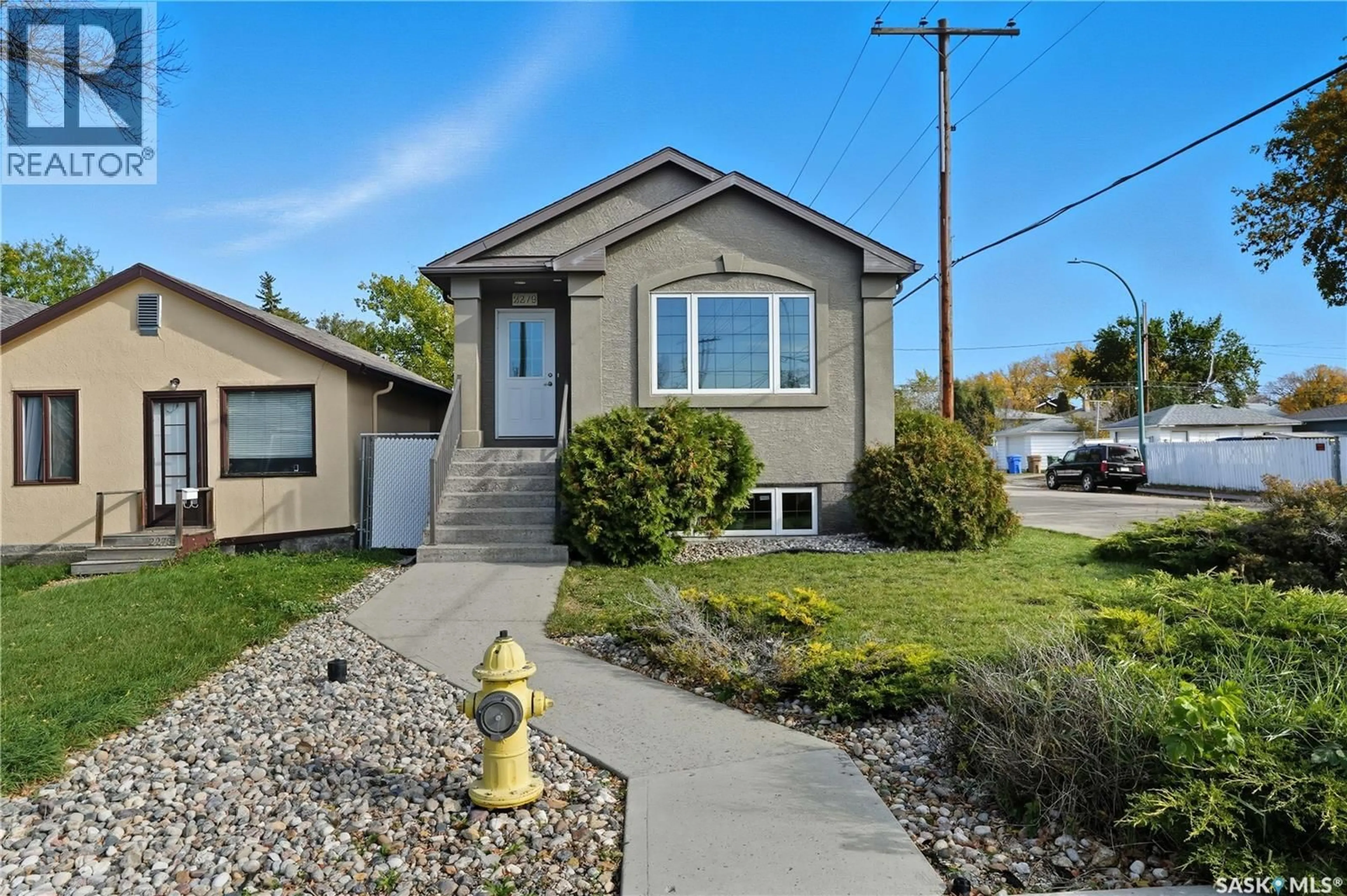 Home with vinyl exterior material, street for 2279 MACKAY STREET, Regina Saskatchewan S4N2S9