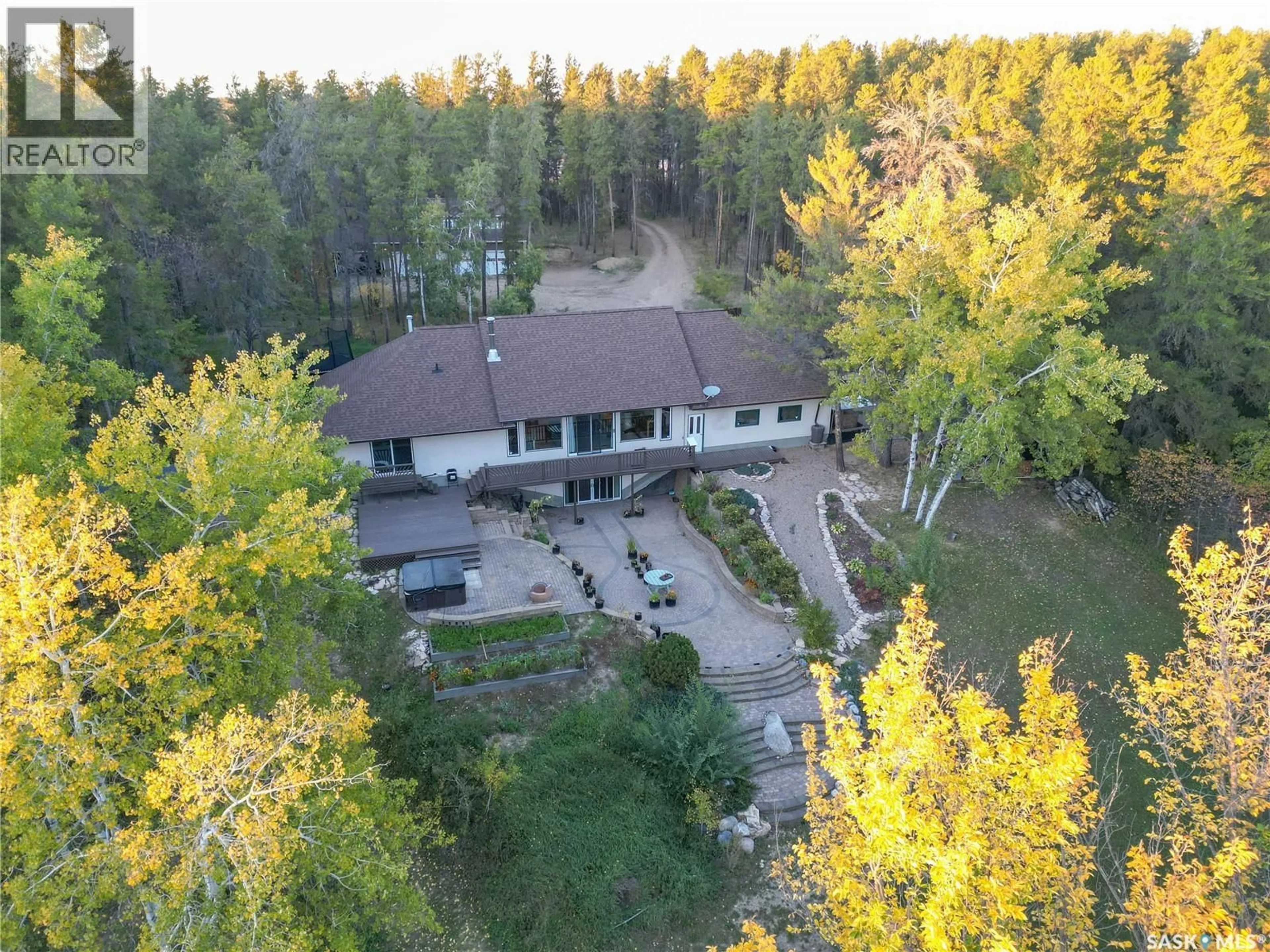 A pic from outside/outdoor area/front of a property/back of a property/a pic from drone, forest/trees view for 358 PINE DRIVE, Buckland Rm No. 491 Saskatchewan S6V5R3