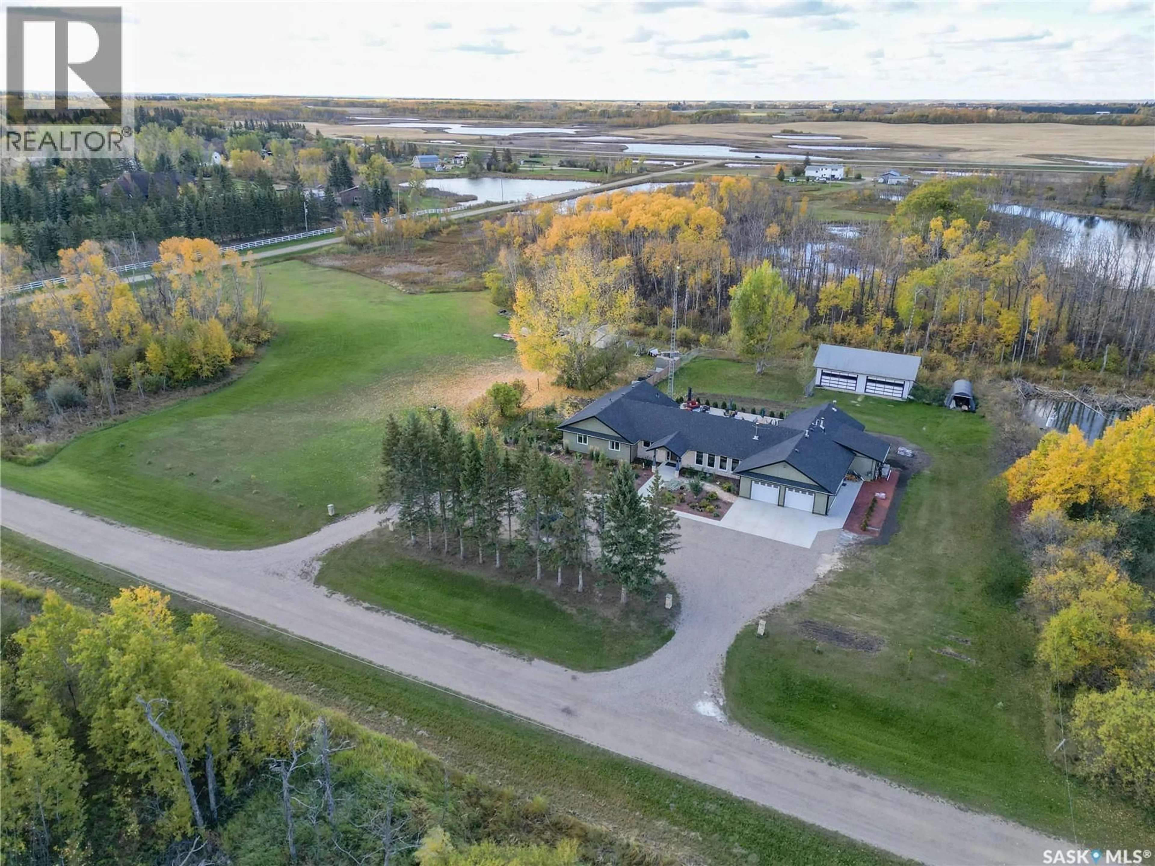 A pic from outside/outdoor area/front of a property/back of a property/a pic from drone, unknown for 6111 MADDEN PLACE, Buckland Rm No. 491 Saskatchewan S6V5R3