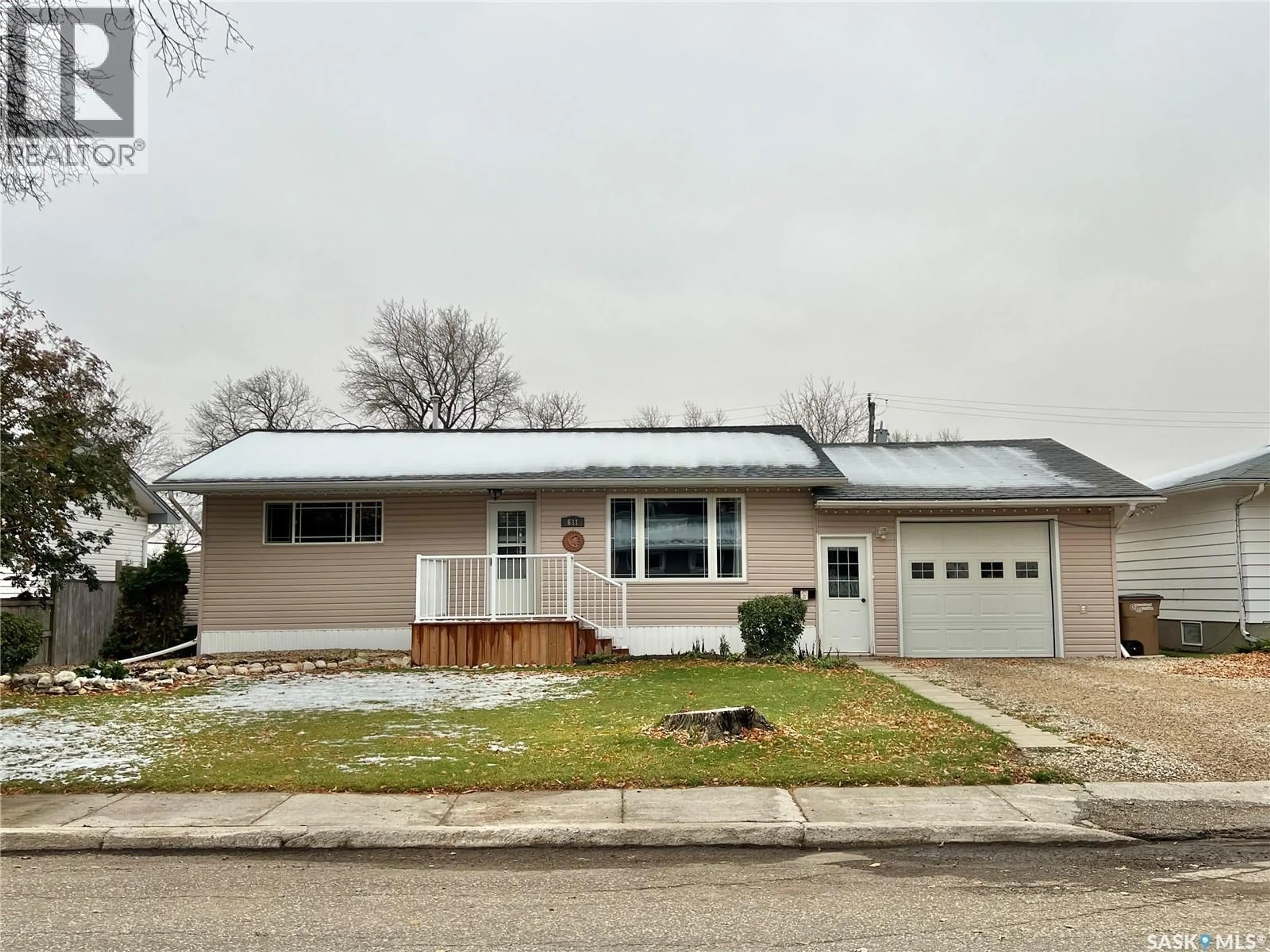 Home with vinyl exterior material, street for 631 MACLEOD AVENUE, Melfort Saskatchewan S0E1A0