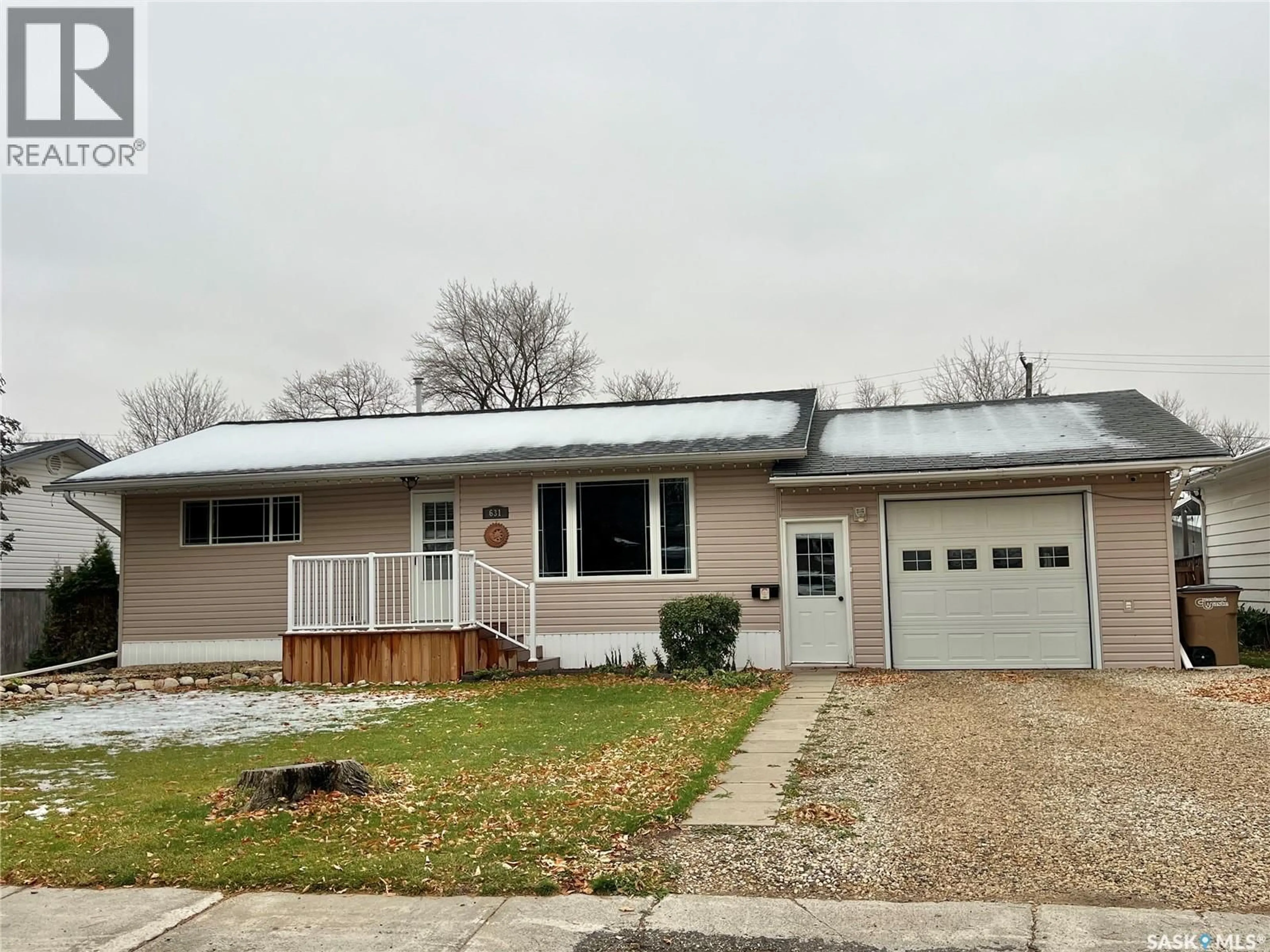 Home with vinyl exterior material, street for 631 MACLEOD AVENUE, Melfort Saskatchewan S0E1A0