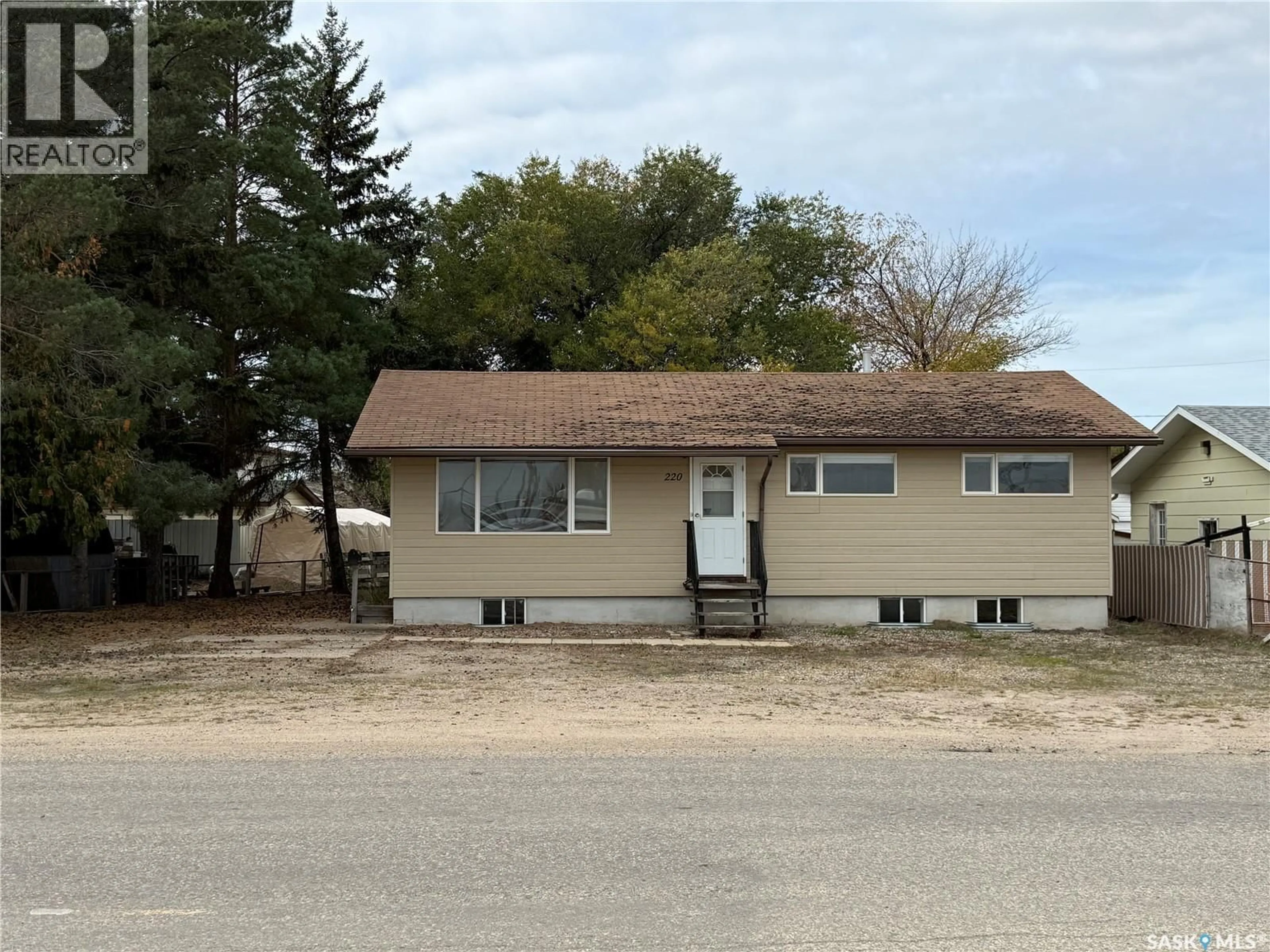 Home with vinyl exterior material, street for 220 4TH STREET, Spiritwood Saskatchewan S0J2M0