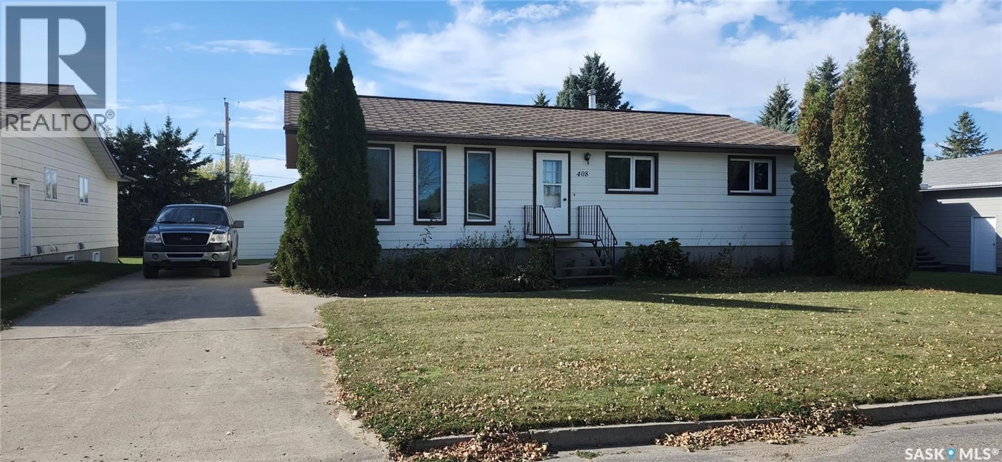 Home with vinyl exterior material, street for 408 5TH STREET, Wynyard Saskatchewan S0A4T0