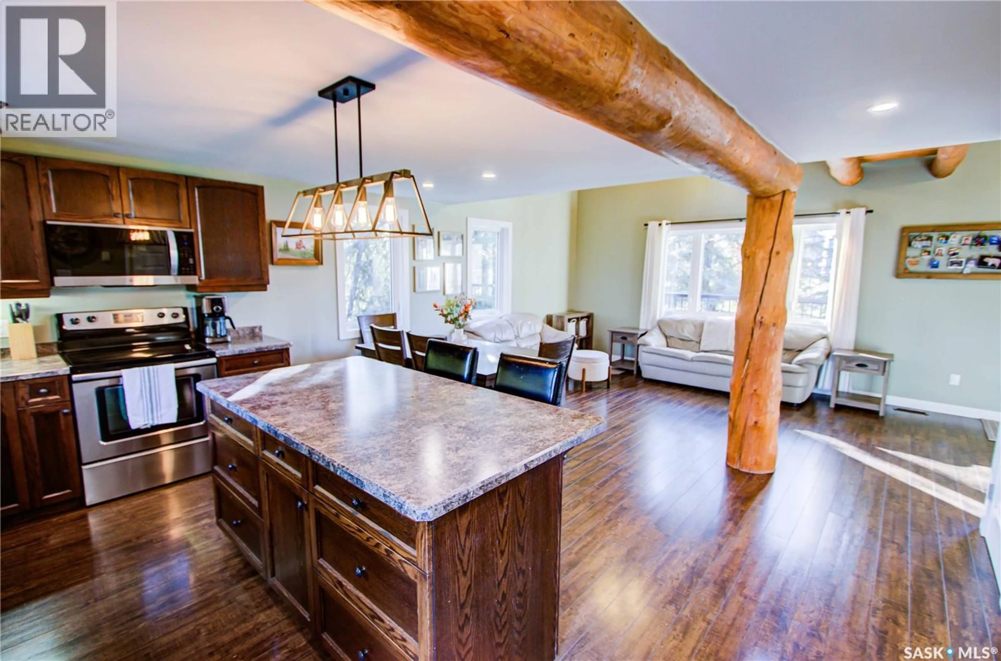 Open concept kitchen, wood/laminate floor for 437 2ND STREET, Beatty Saskatchewan S0J0C0