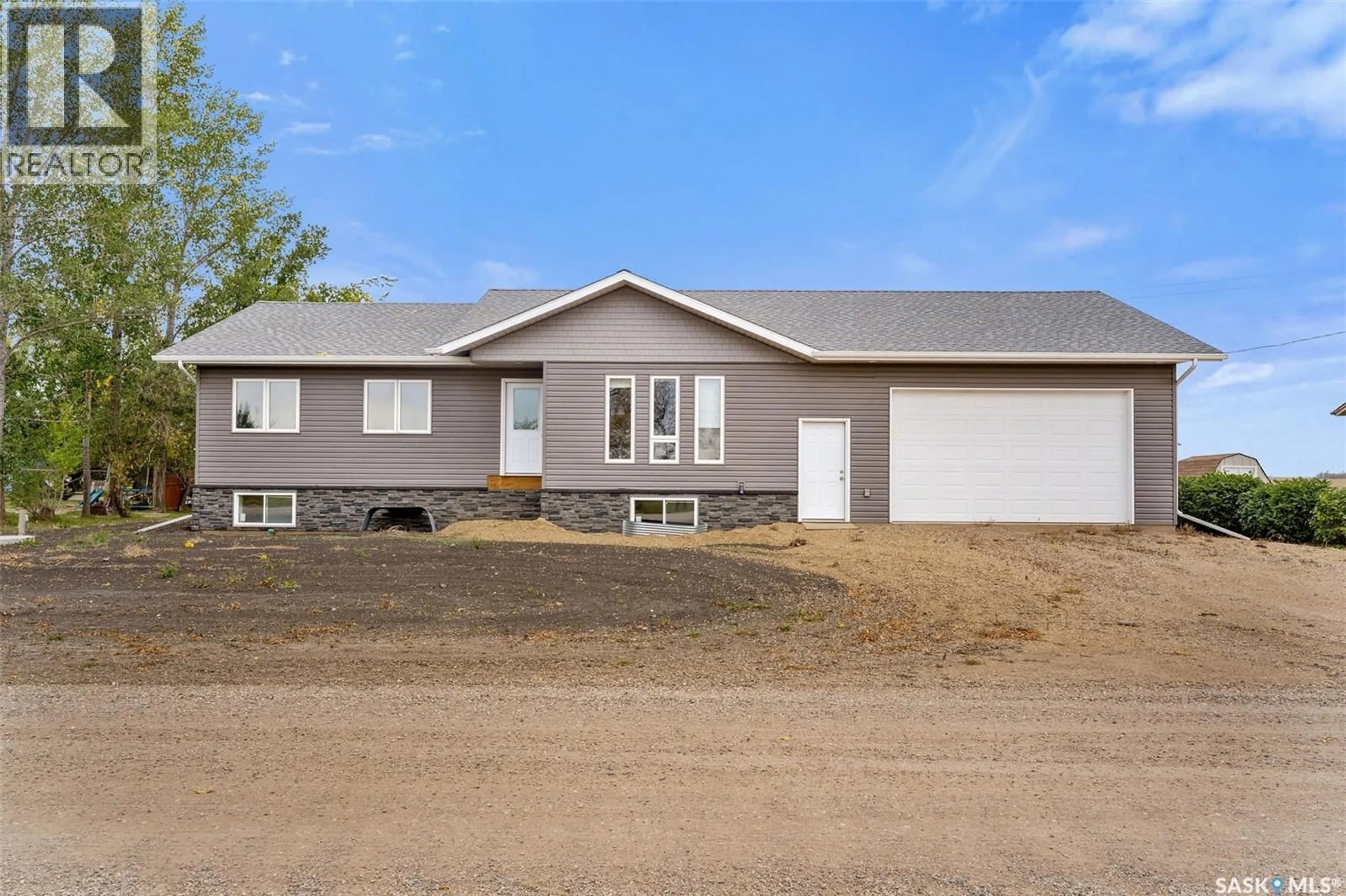 Home with vinyl exterior material, street for 113 1ST STREET, Beatty Saskatchewan S0J0C0