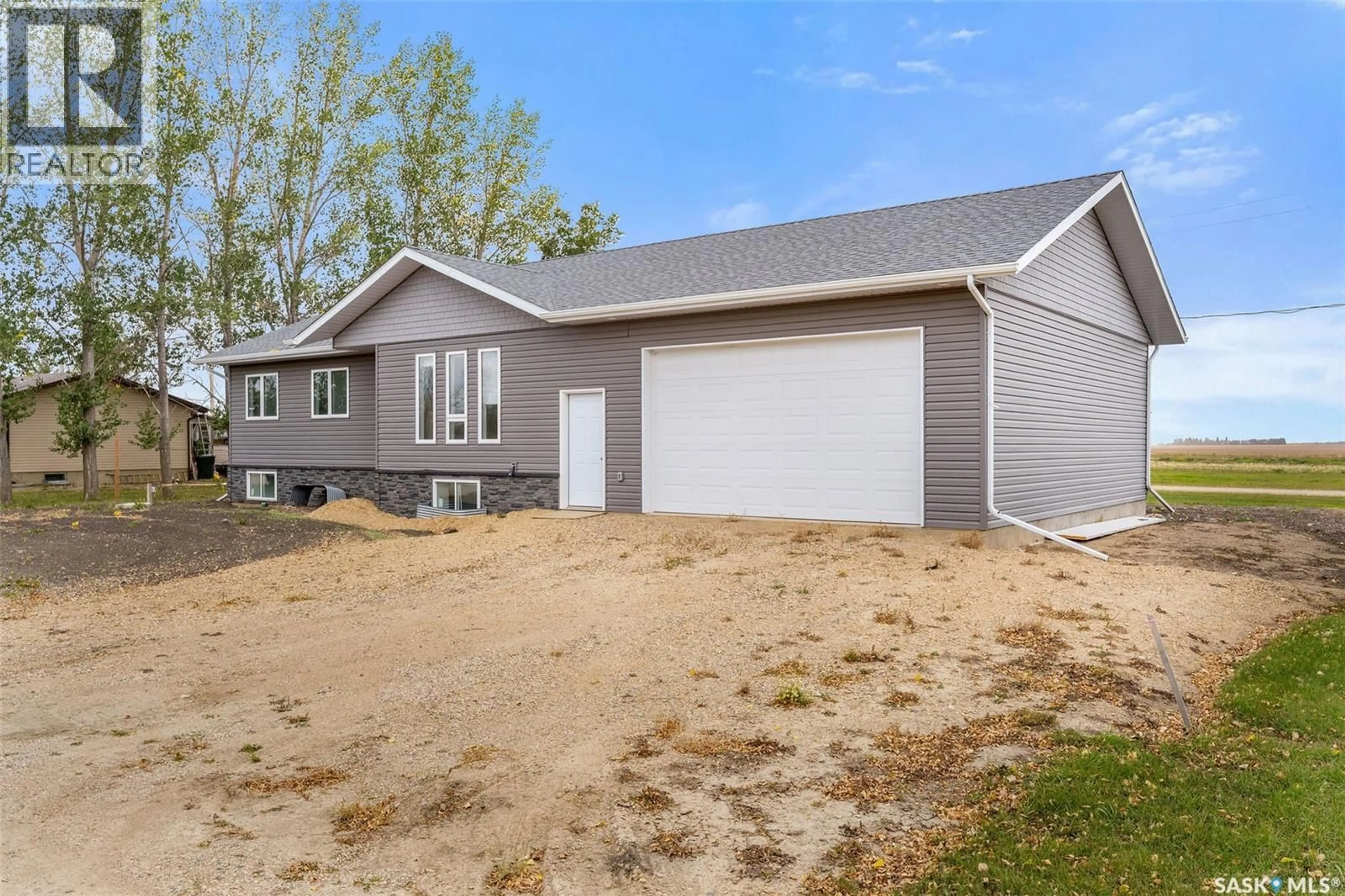 Home with vinyl exterior material, street for 113 1ST STREET, Beatty Saskatchewan S0J0C0