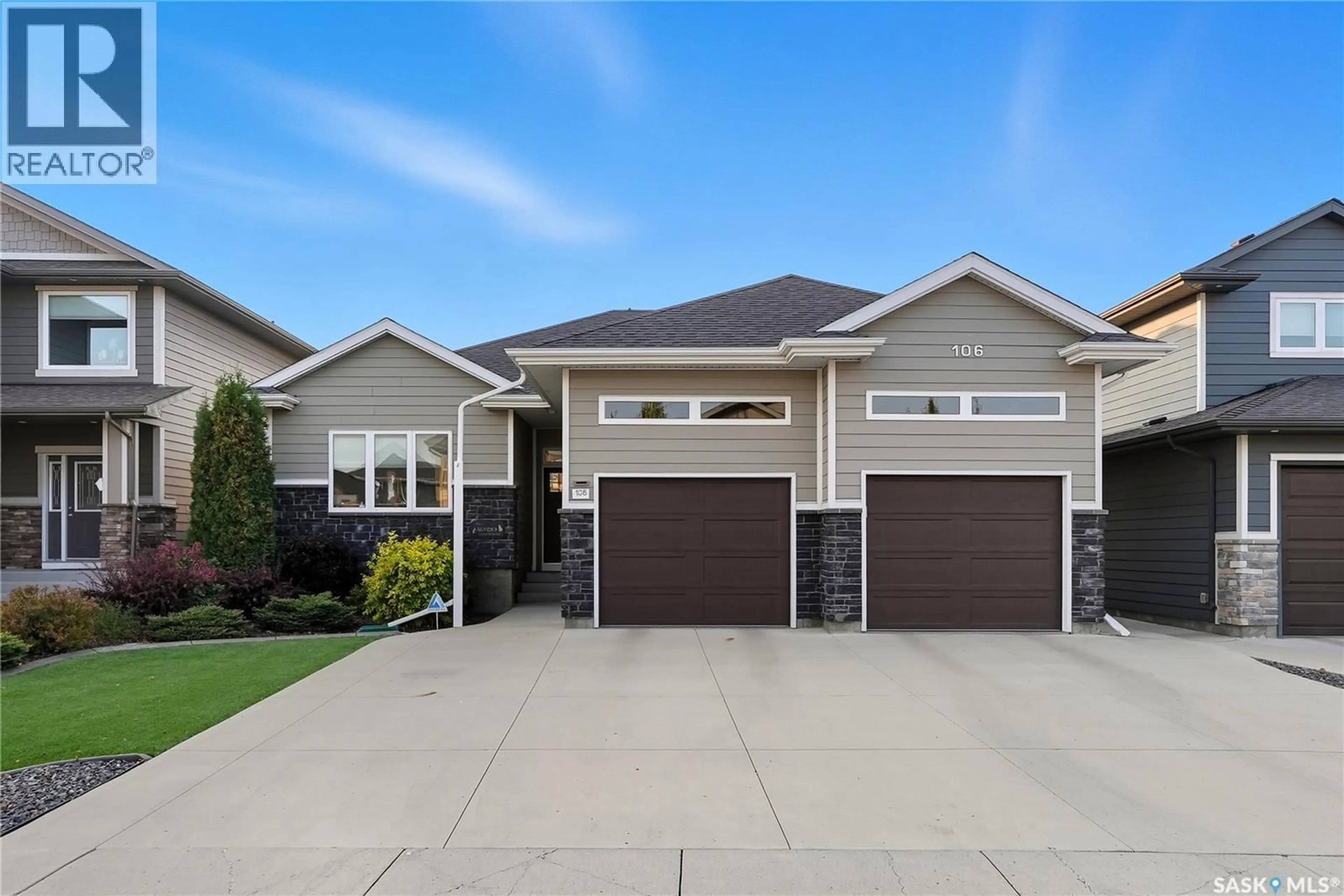 Home with vinyl exterior material, street for 106 PRINGLE CRESCENT, Saskatoon Saskatchewan S7T0S3