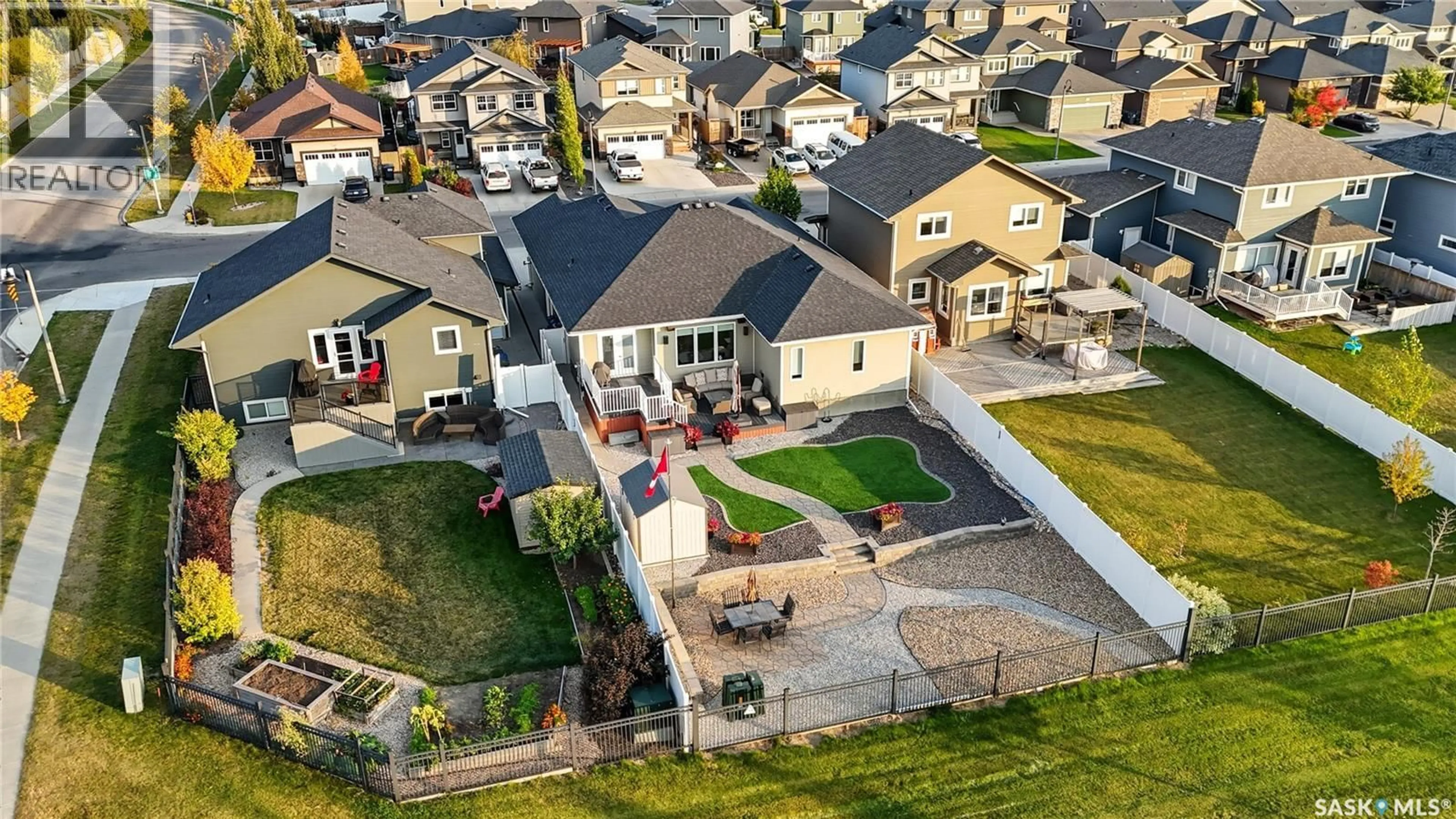 A pic from outside/outdoor area/front of a property/back of a property/a pic from drone, street for 106 PRINGLE CRESCENT, Saskatoon Saskatchewan S7T0S3