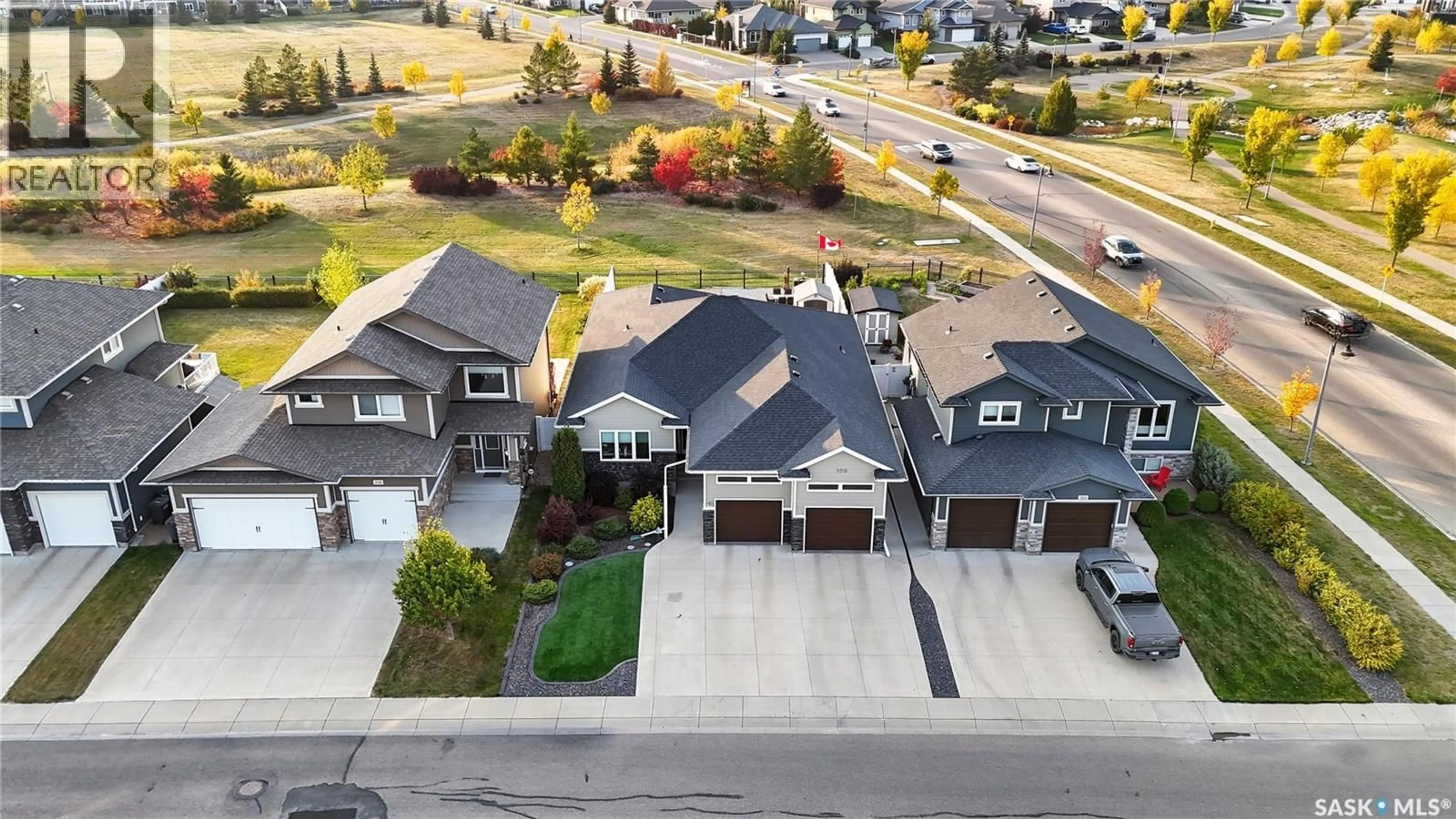 A pic from outside/outdoor area/front of a property/back of a property/a pic from drone, street for 106 PRINGLE CRESCENT, Saskatoon Saskatchewan S7T0S3