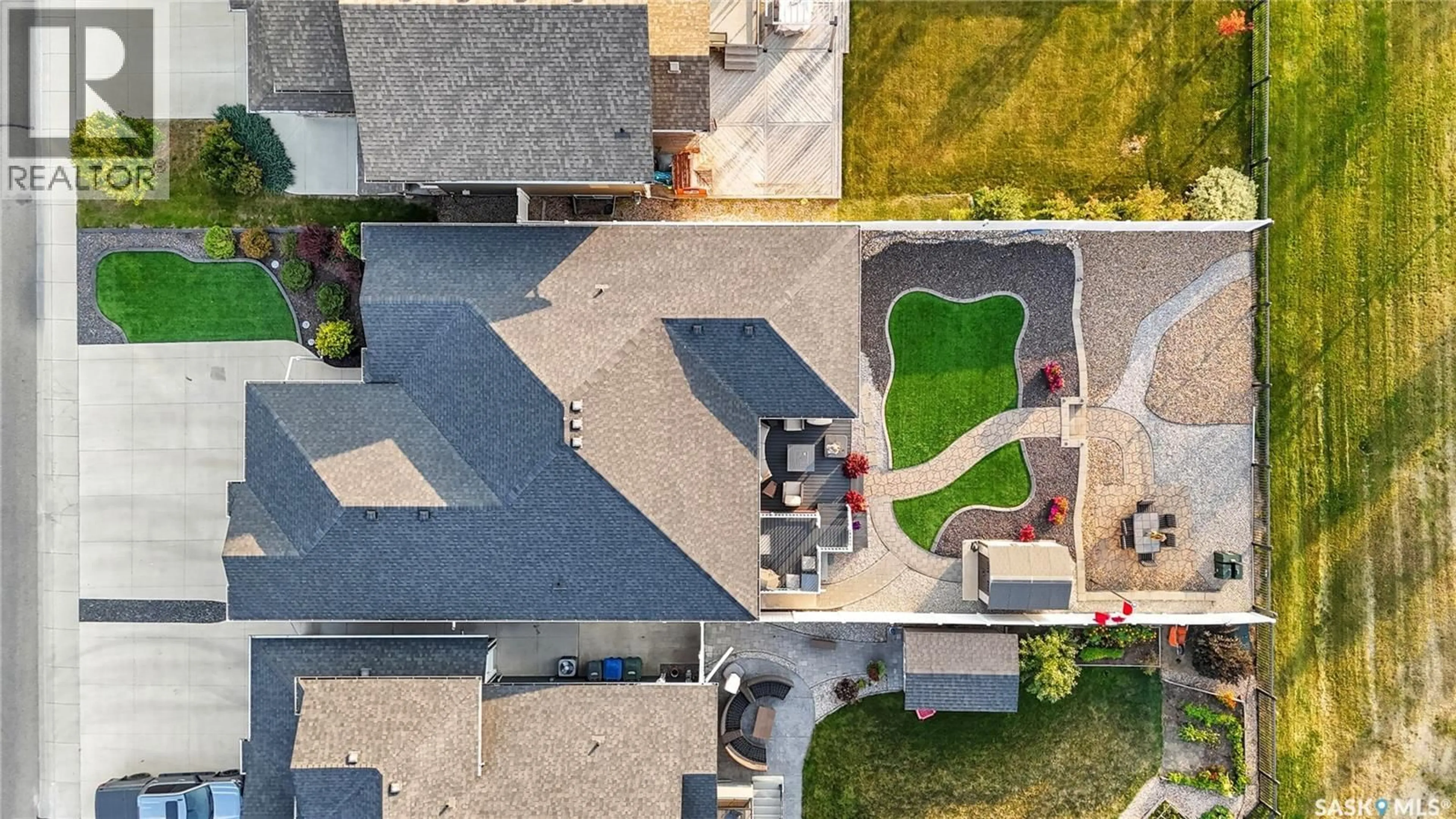 A pic from outside/outdoor area/front of a property/back of a property/a pic from drone, street for 106 PRINGLE CRESCENT, Saskatoon Saskatchewan S7T0S3