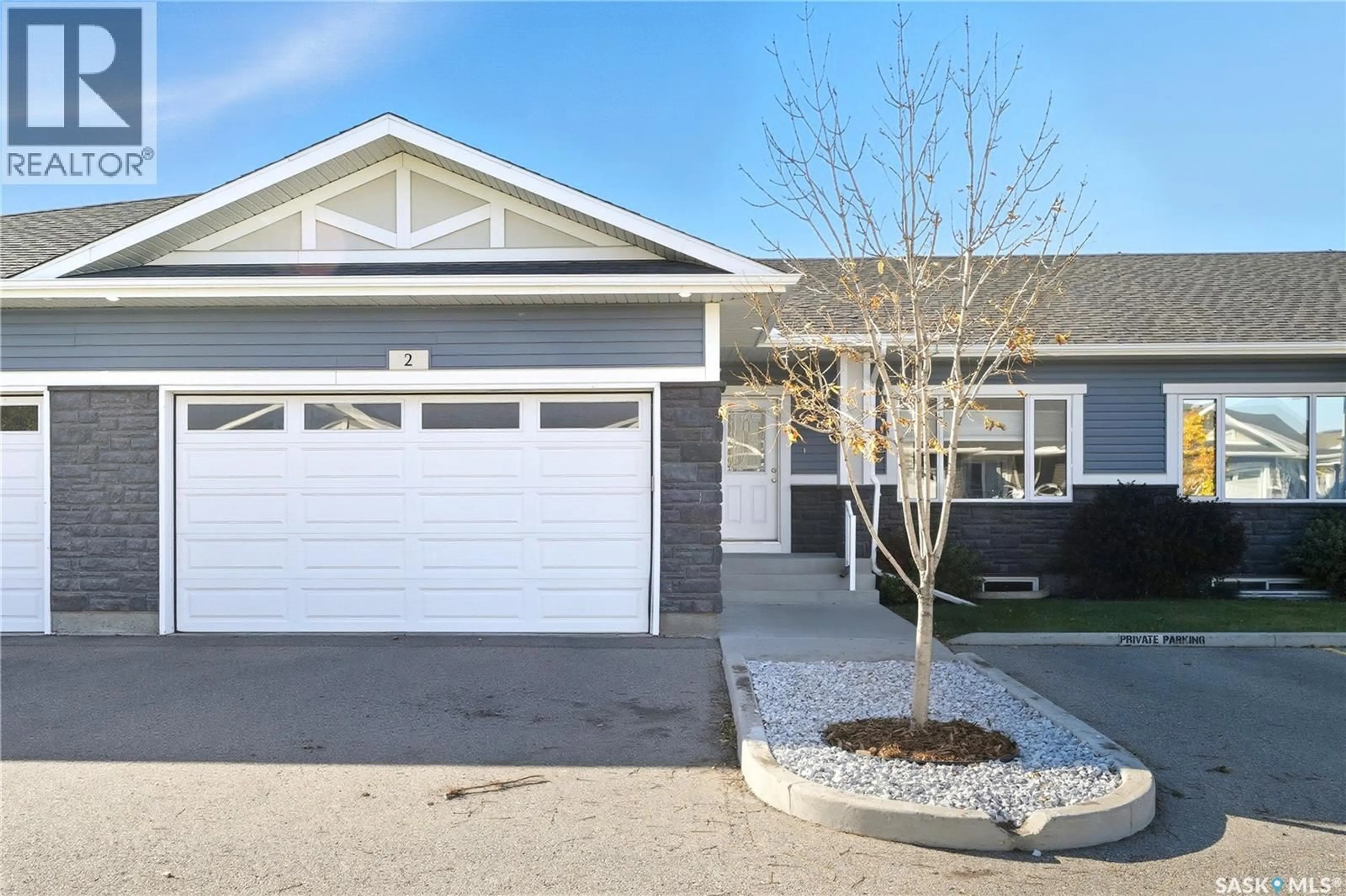 Home with vinyl exterior material, street for 2 - 3214 11TH STREET, Saskatoon Saskatchewan S7M5G3