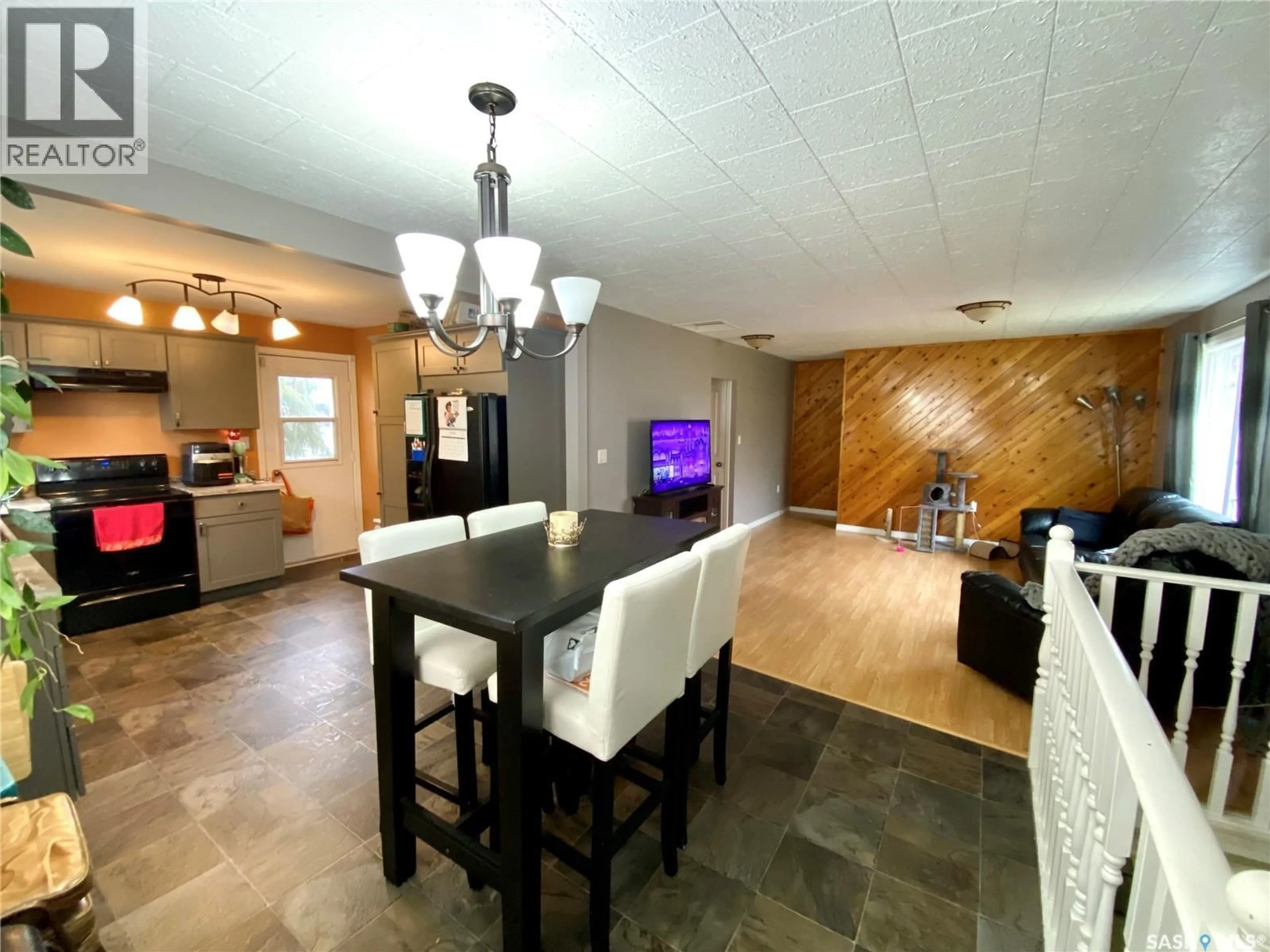Open concept kitchen, ceramic/tile floor for E - 204 4TH STREET, Carnduff Saskatchewan S0C0S0