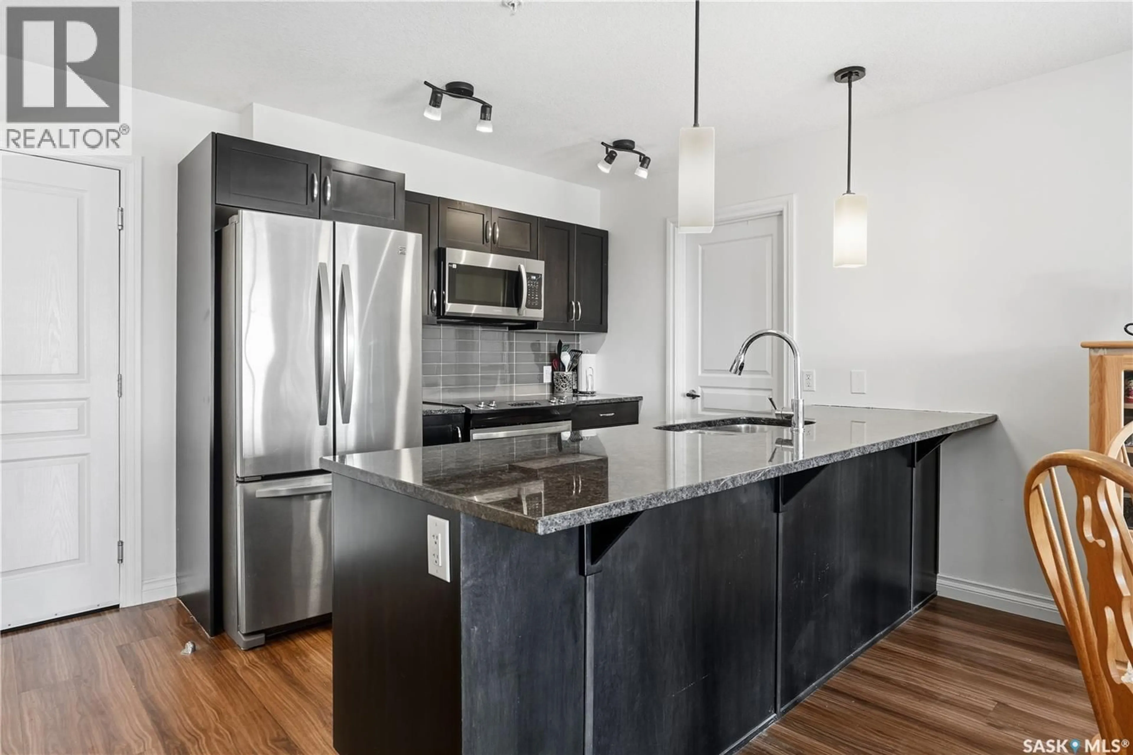 Open concept kitchen, unknown for 215 - 5303 UNIVERSAL CRESCENT, Regina Saskatchewan S4W0L1