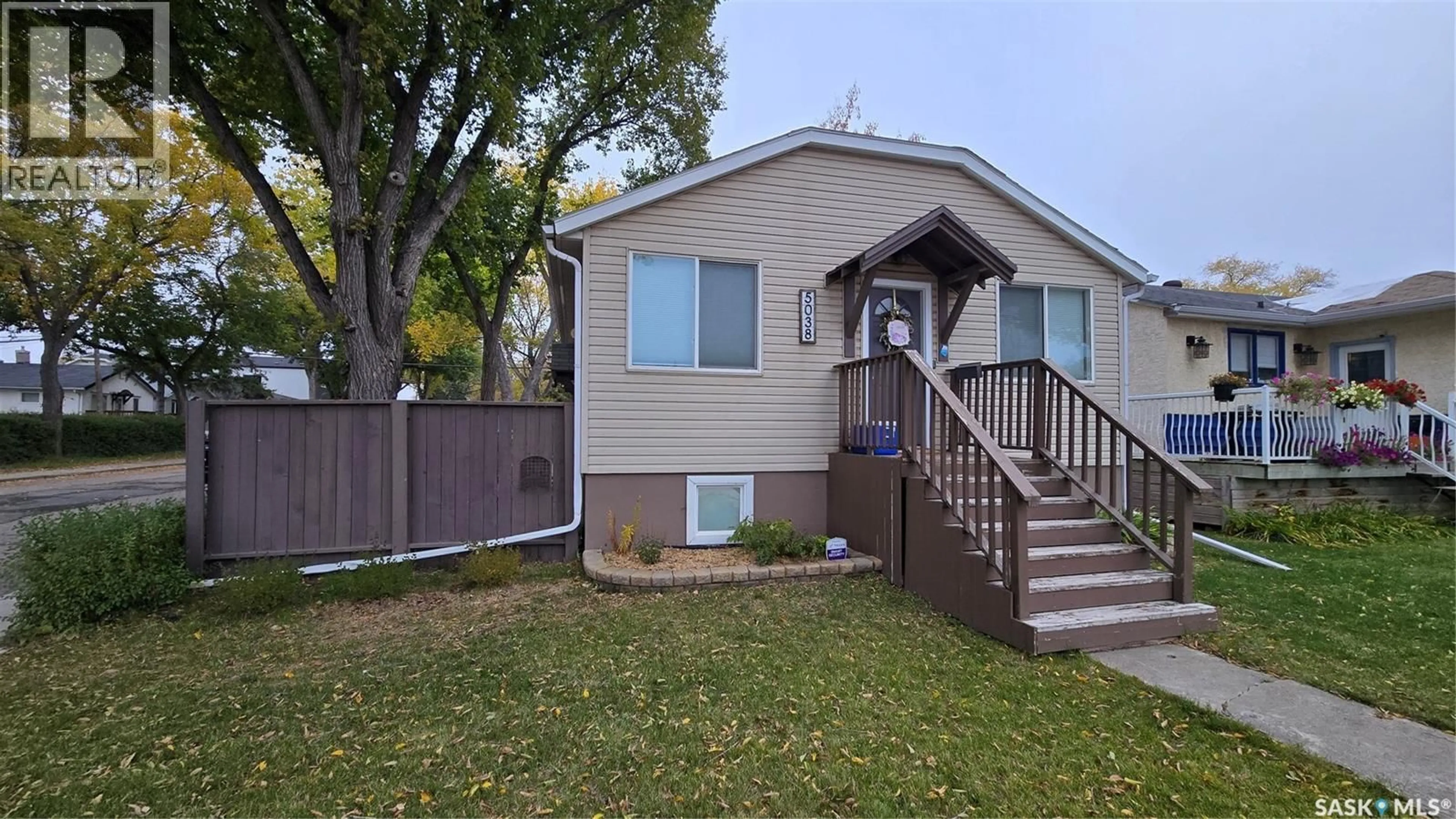 Home with vinyl exterior material, street for 5038 DEWDNEY AVENUE, Regina Saskatchewan S4T1B9