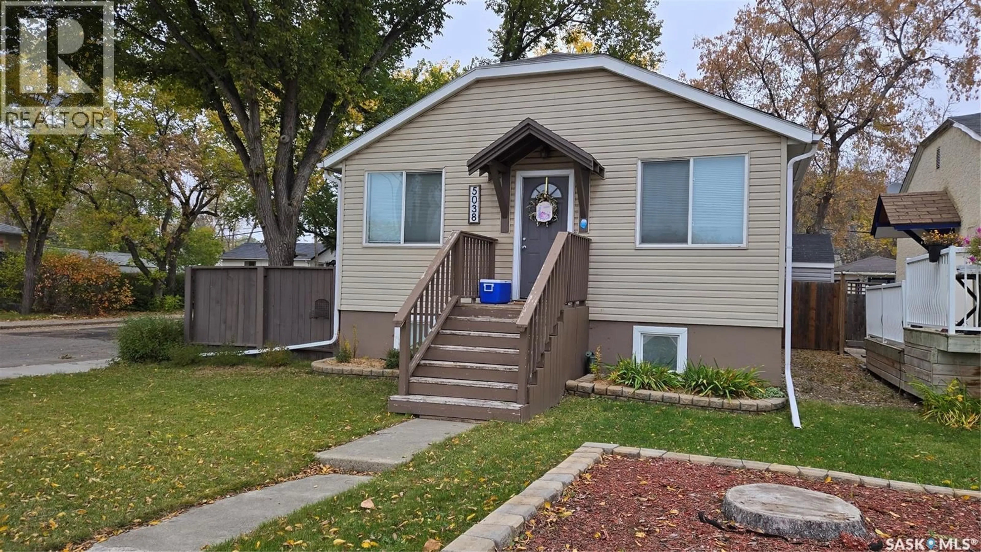 Home with vinyl exterior material, street for 5038 DEWDNEY AVENUE, Regina Saskatchewan S4T1B9
