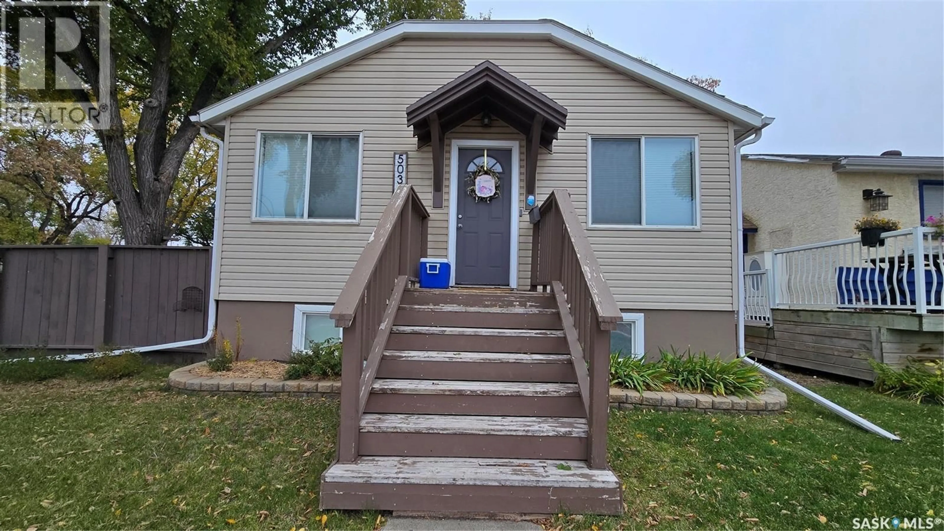 Home with vinyl exterior material, street for 5038 DEWDNEY AVENUE, Regina Saskatchewan S4T1B9
