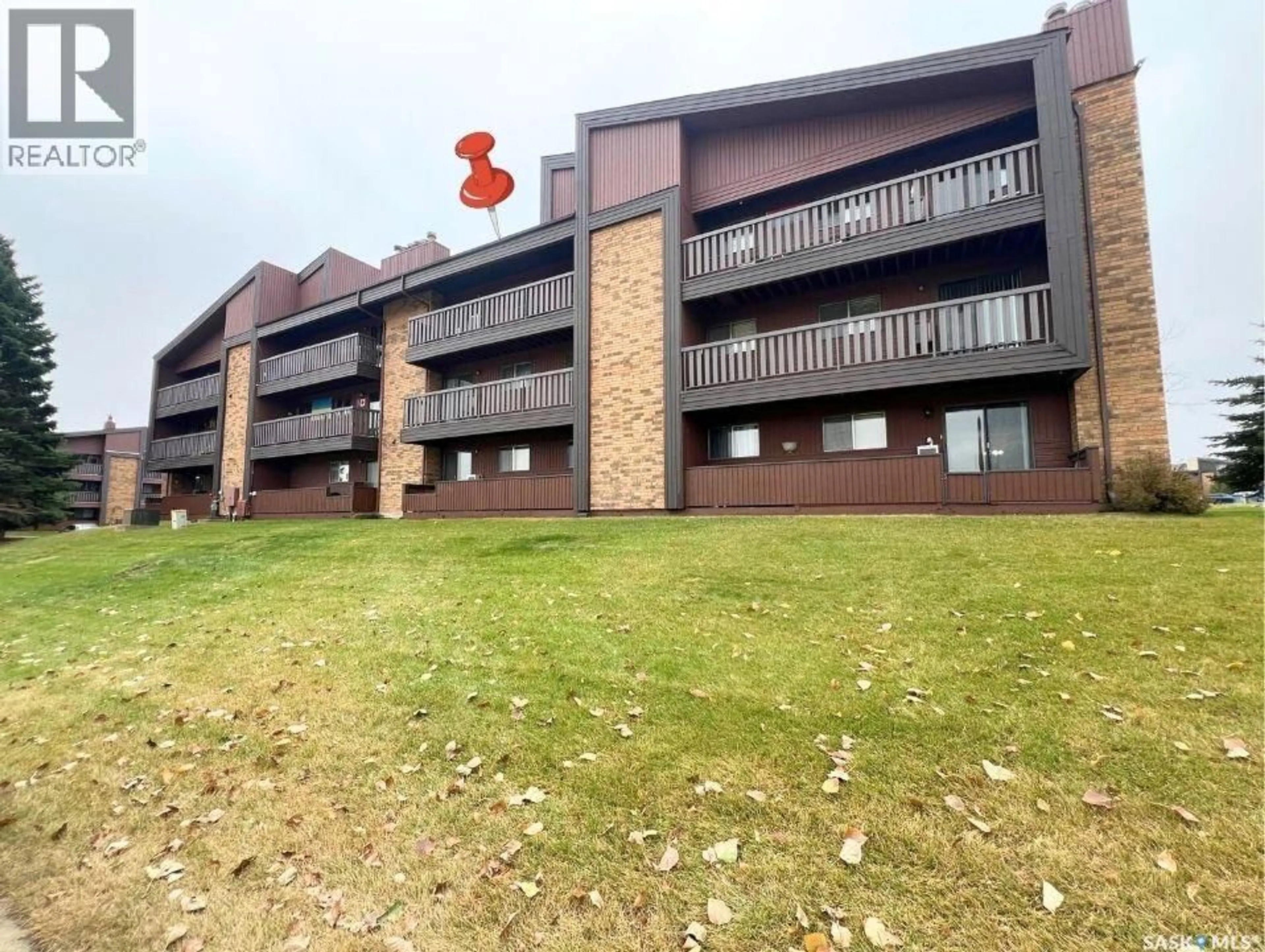 A pic from outside/outdoor area/front of a property/back of a property/a pic from drone, building for 103 - 1140 9TH AVENUE, Swift Current Saskatchewan S9H2S9