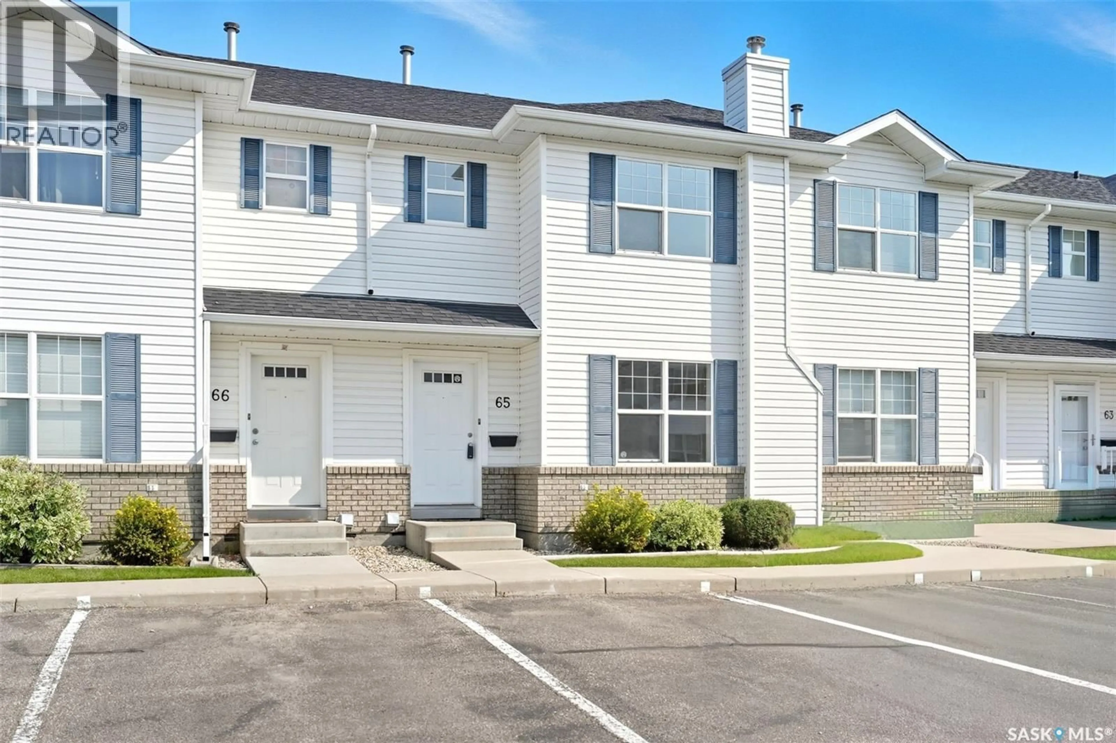 Home with vinyl exterior material, street for 65 203 HEROLD TERRACE, Saskatoon Saskatchewan S7V1H5