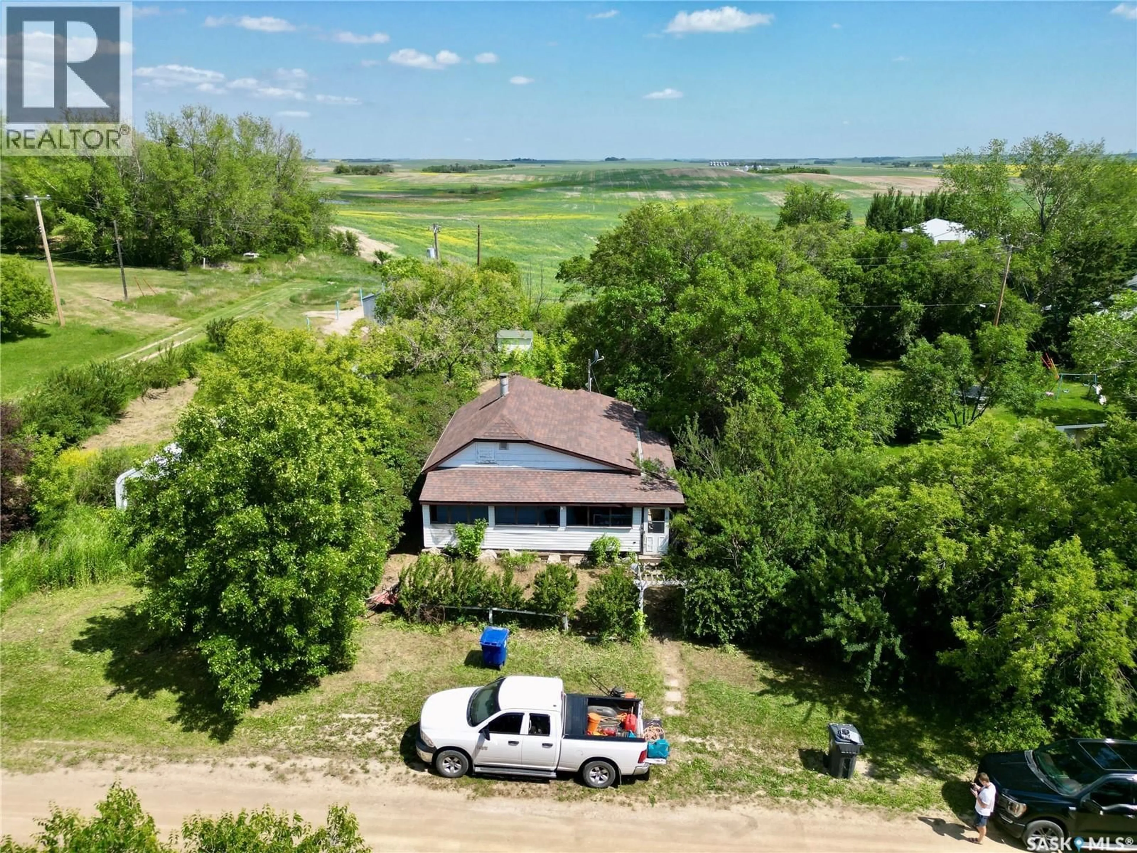A pic from outside/outdoor area/front of a property/back of a property/a pic from drone, water/lake/river/ocean view for 48 HELENA STREET, Prud'homme Saskatchewan S0K3K0