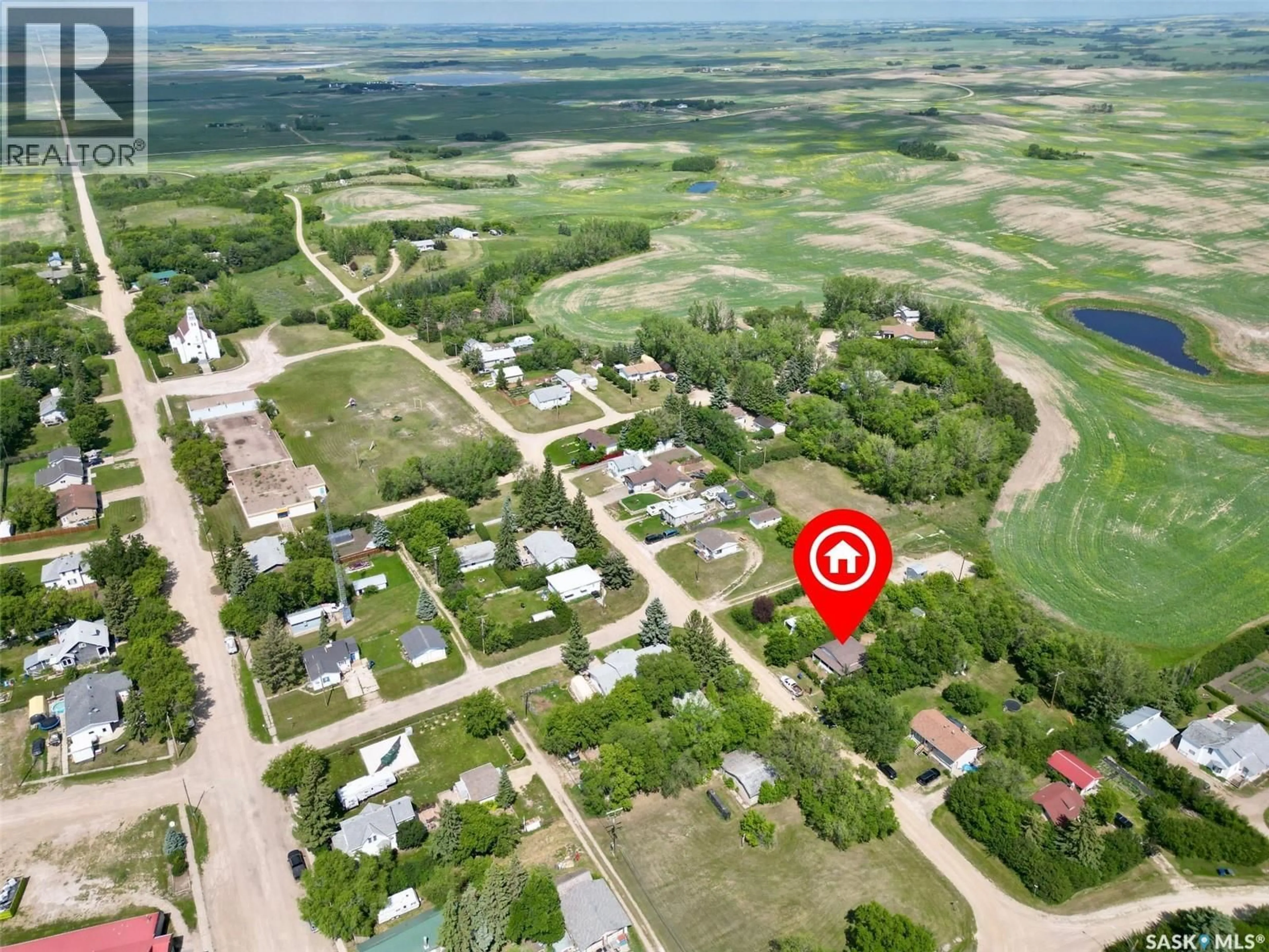 A pic from outside/outdoor area/front of a property/back of a property/a pic from drone, street for 48 HELENA STREET, Prud'homme Saskatchewan S0K3K0