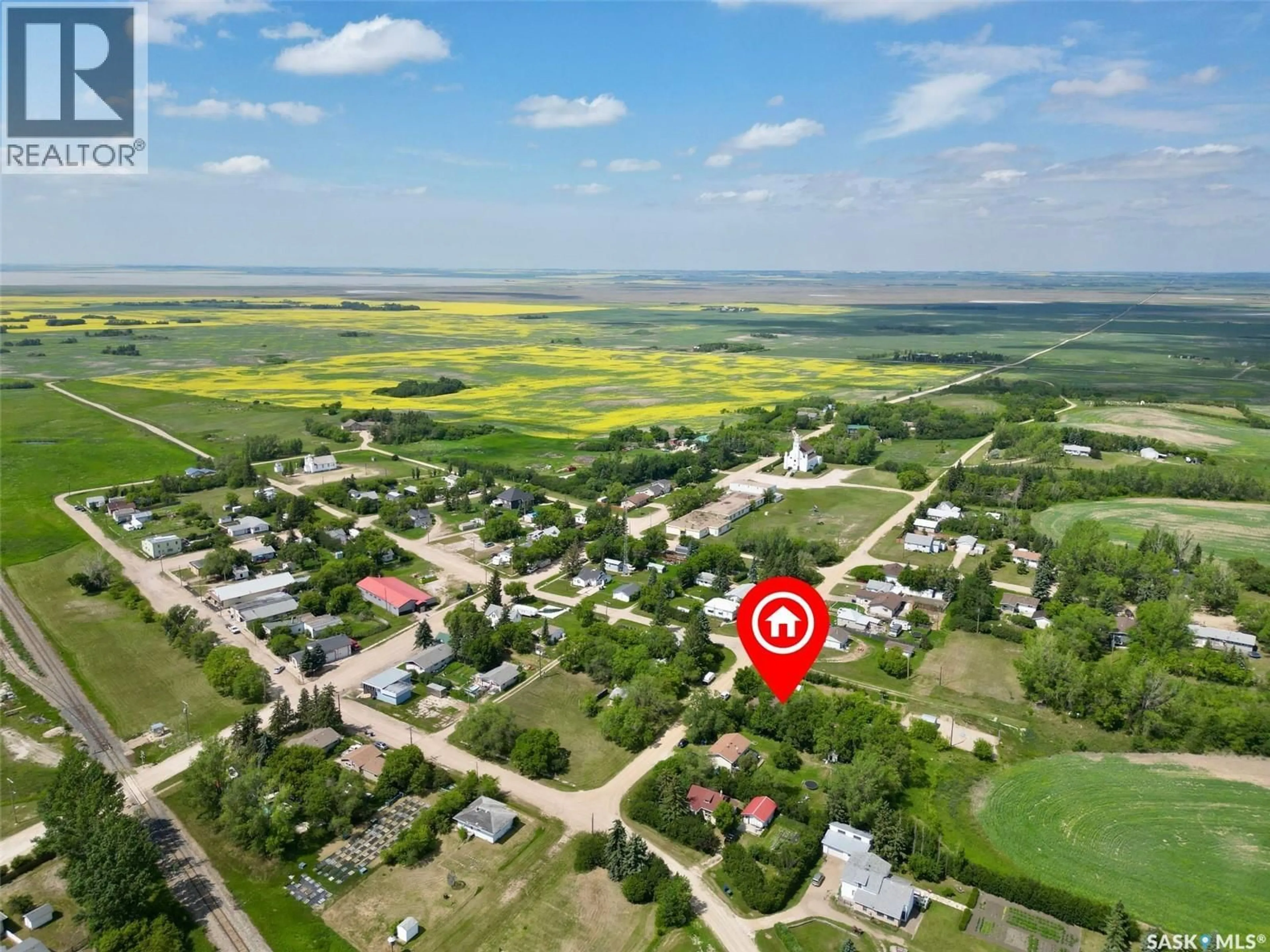 A pic from outside/outdoor area/front of a property/back of a property/a pic from drone, street for 48 HELENA STREET, Prud'homme Saskatchewan S0K3K0