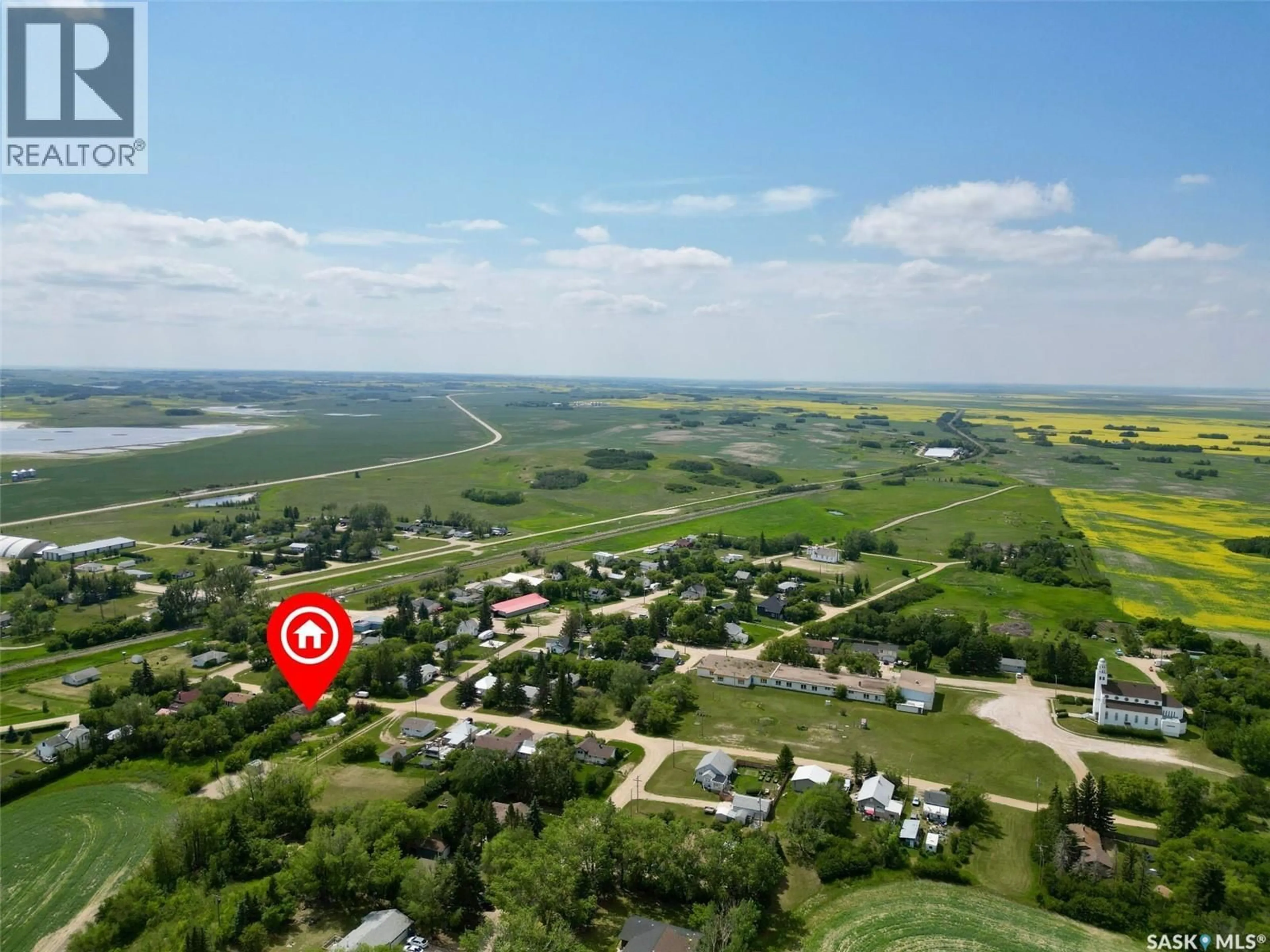 A pic from outside/outdoor area/front of a property/back of a property/a pic from drone, water/lake/river/ocean view for 48 HELENA STREET, Prud'homme Saskatchewan S0K3K0
