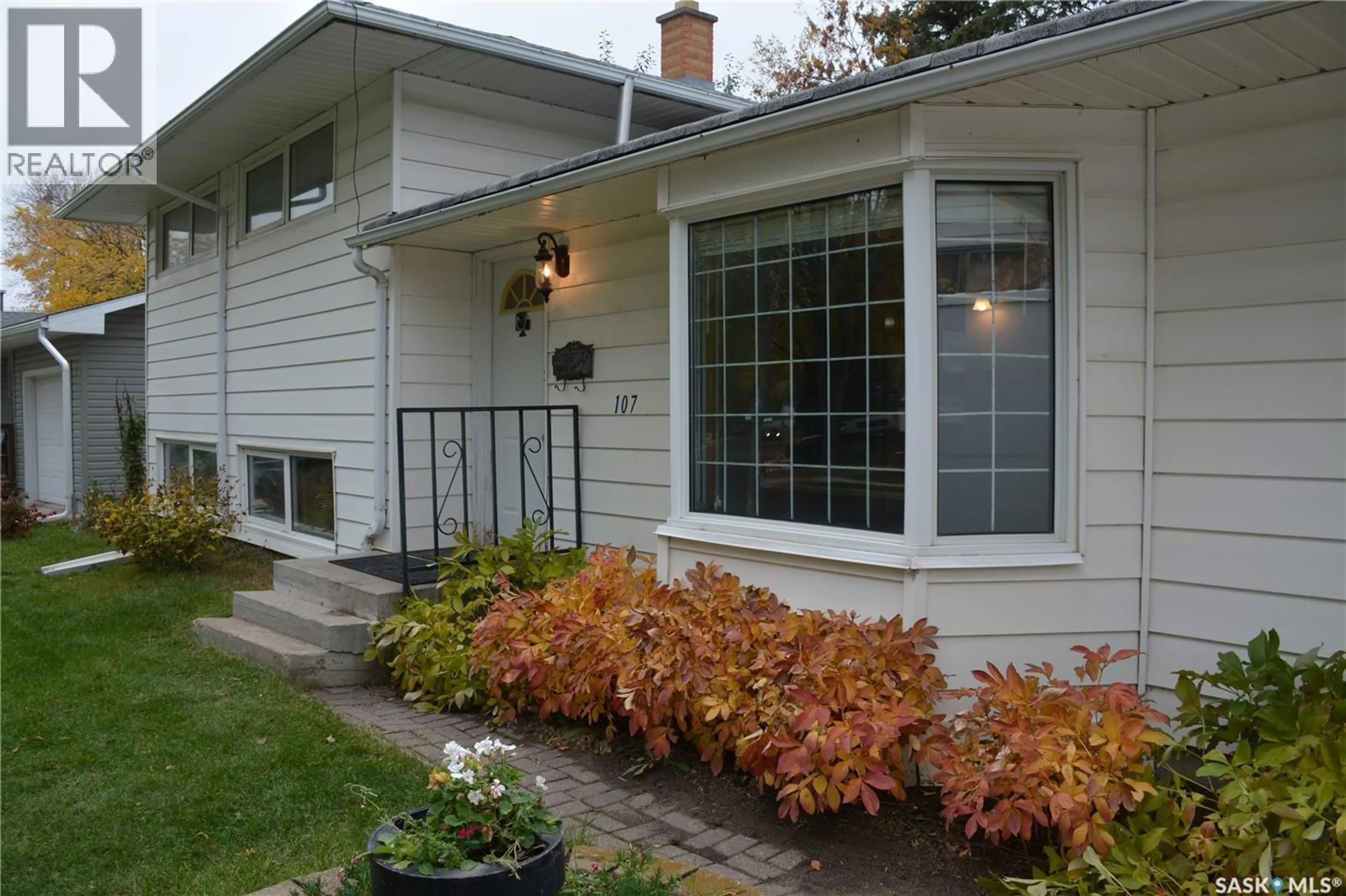 Home with vinyl exterior material, street for 107 KNOWLES CRESCENT, Regina Saskatchewan S4N4P3