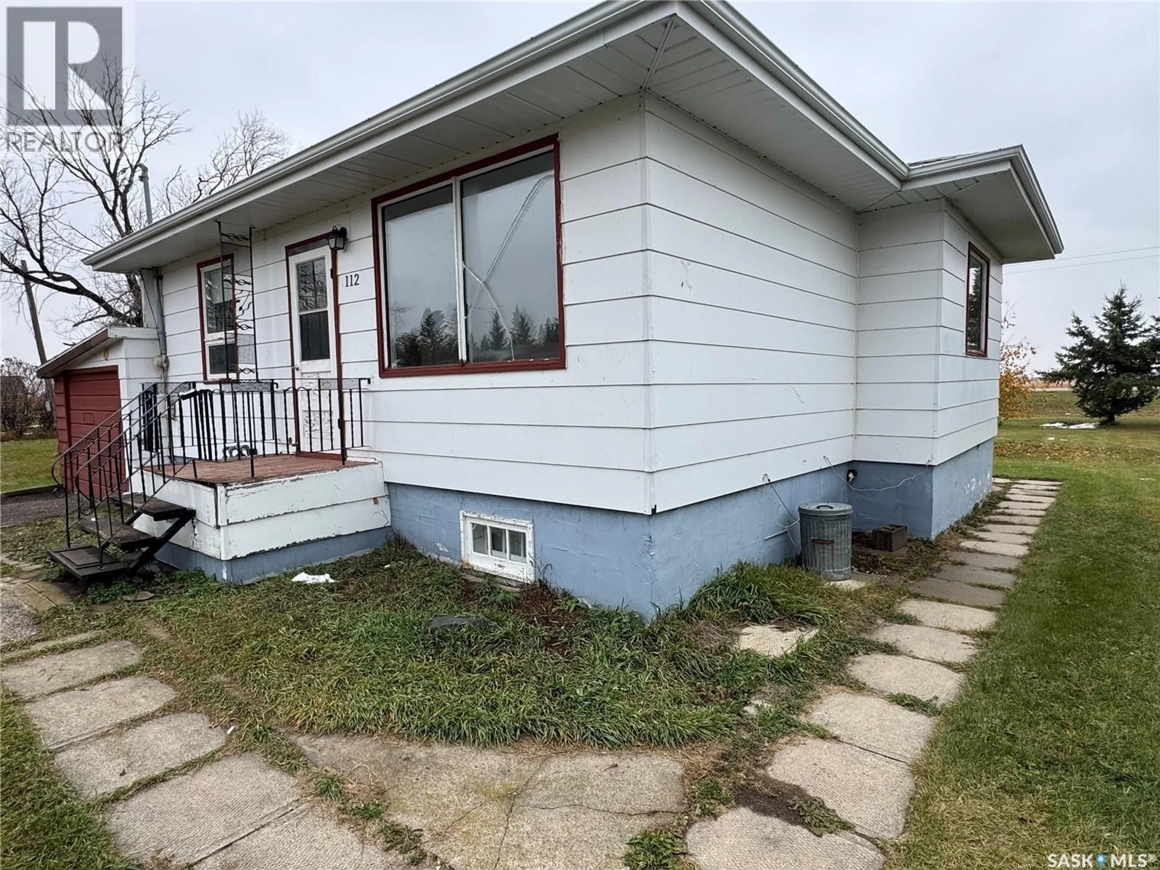 Home with vinyl exterior material, street for S - 108-112 2ND AVENUE, Fosston Saskatchewan S0E0V0