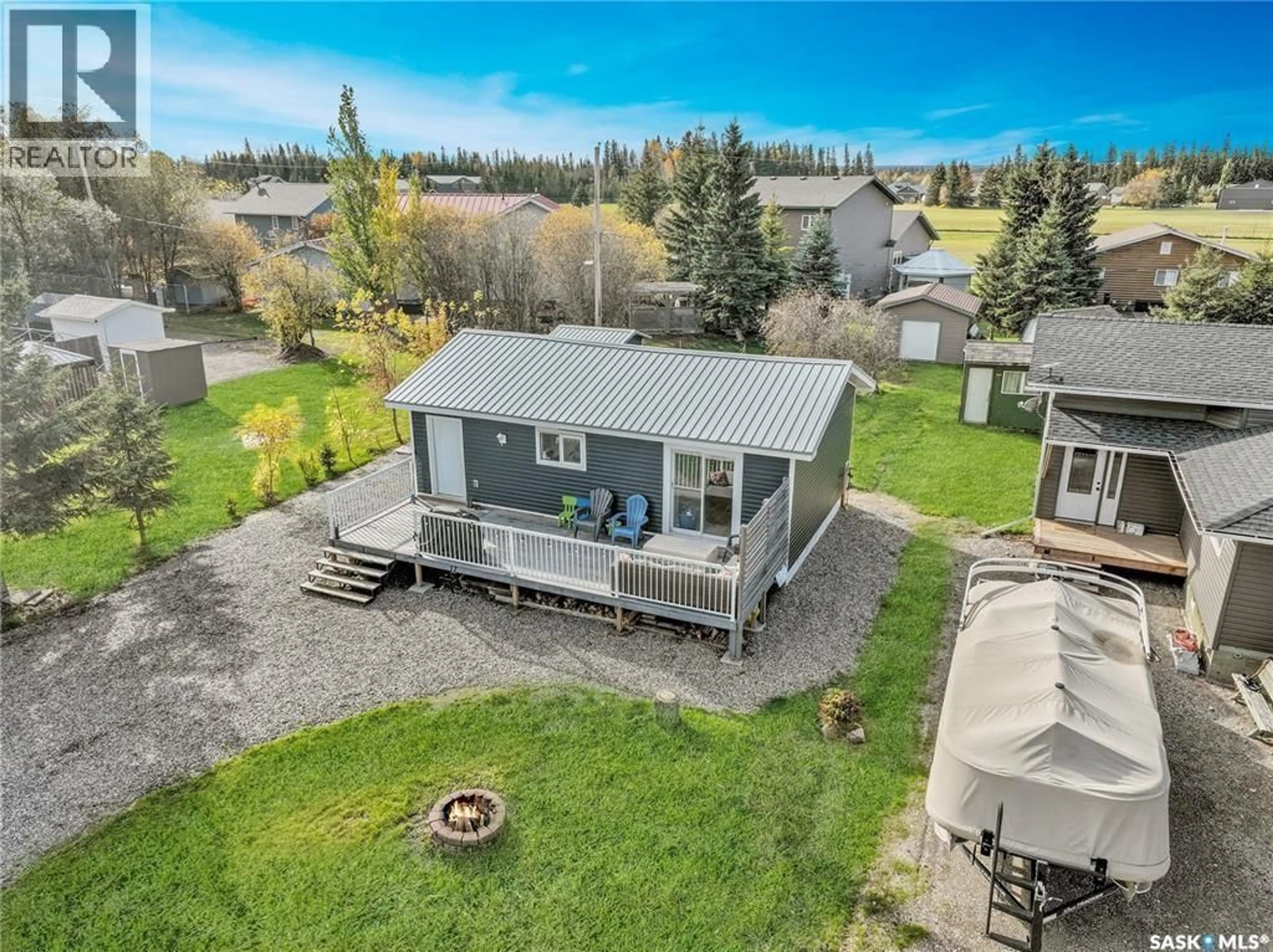 A pic from outside/outdoor area/front of a property/back of a property/a pic from drone, unknown for 17 WHITE POPLAR CRESCENT, Candle Lake Saskatchewan S0J3E0
