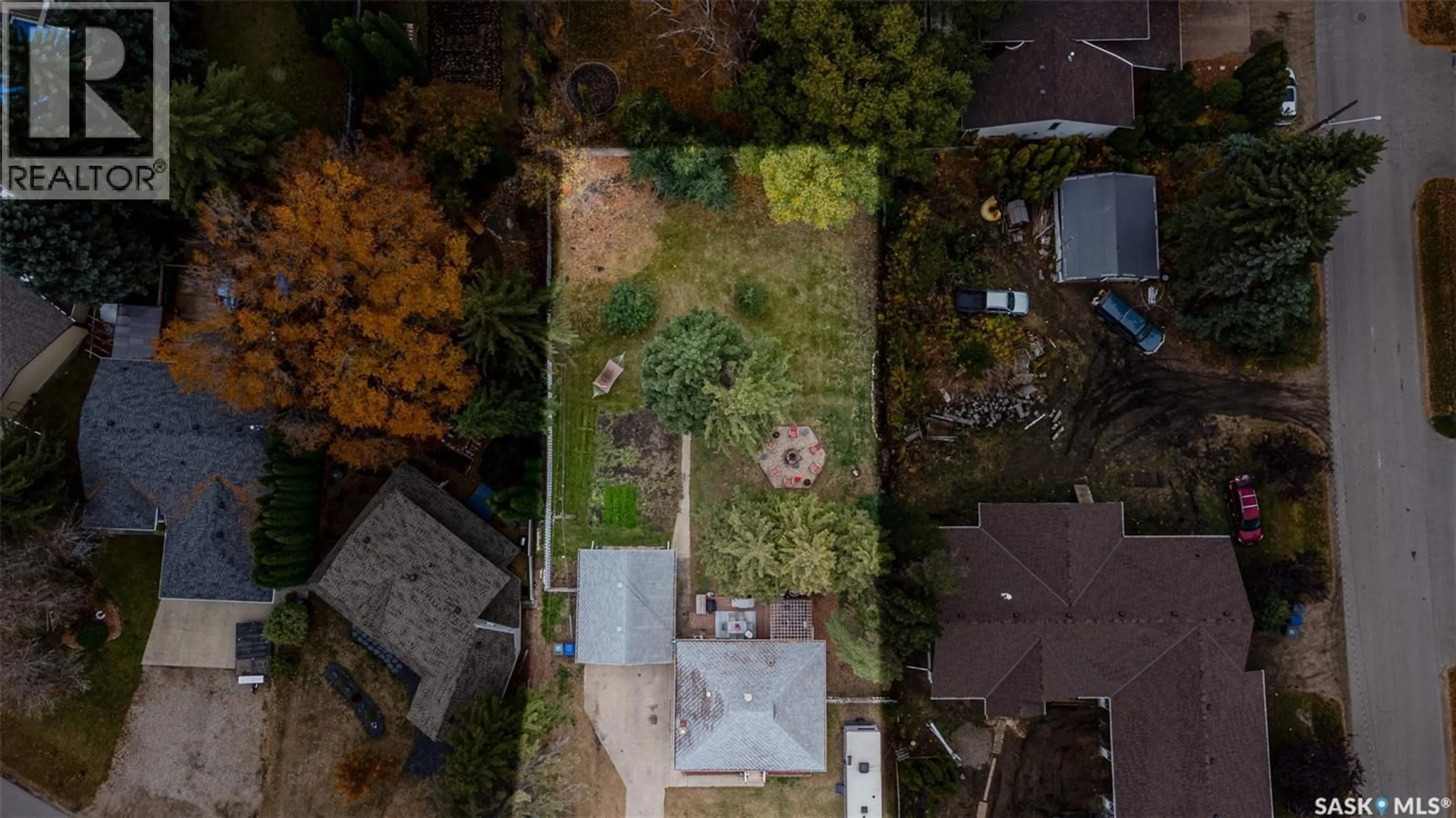A pic from outside/outdoor area/front of a property/back of a property/a pic from drone, street for 1205 LANCASTER BOULEVARD, Saskatoon Saskatchewan S7M3V6