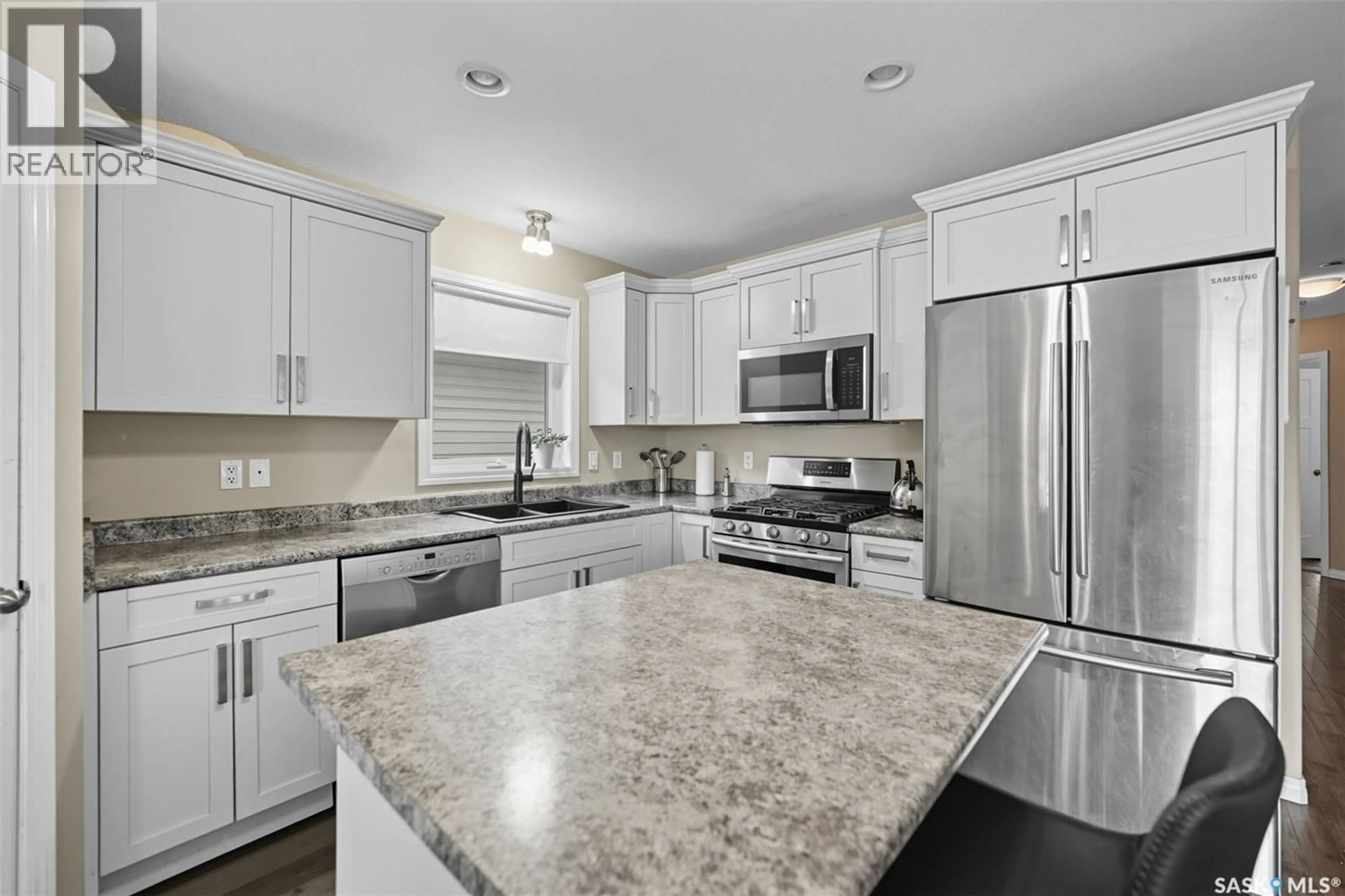 Open concept kitchen, ceramic/tile floor for 130 WYANT LANE, Saskatoon Saskatchewan S7W0N8