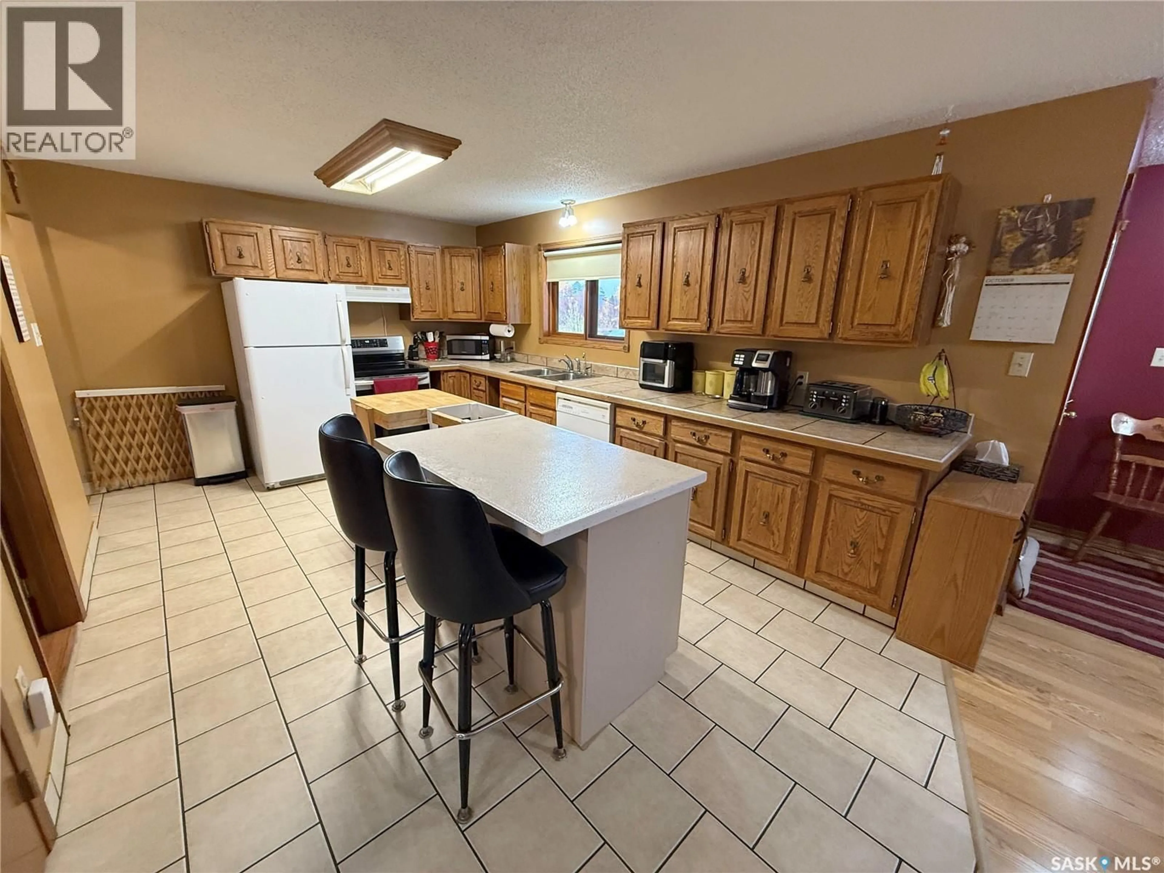 Open concept kitchen, ceramic/tile floor for 695 ELEVATOR ROAD, Duck Lake Saskatchewan S0K1J0