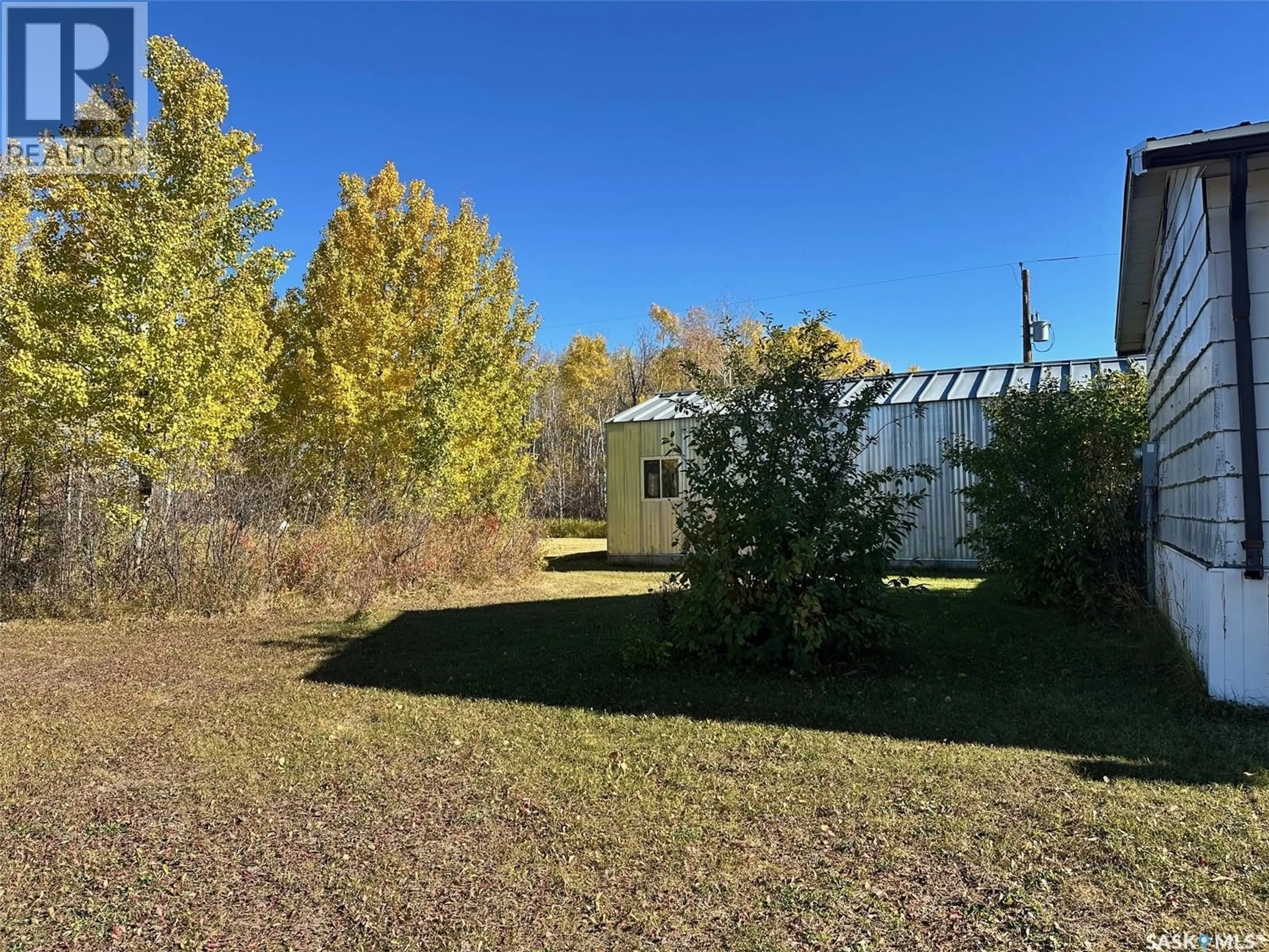 A pic from outside/outdoor area/front of a property/back of a property/a pic from drone, forest/trees view for CABLE ACREAGE, Hudson Bay Rm No. 394 Saskatchewan S0E0Y0
