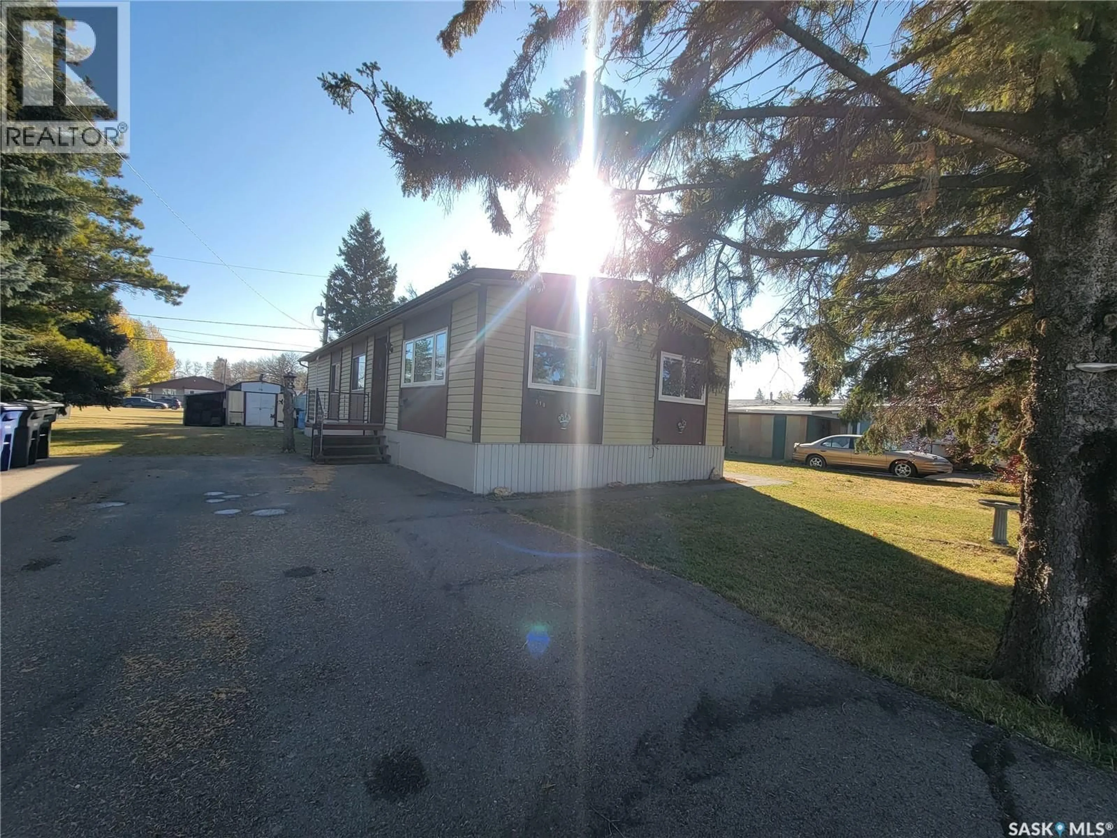 A pic from outside/outdoor area/front of a property/back of a property/a pic from drone, street for 310 5TH STREET, Wilkie Saskatchewan S0L2C0