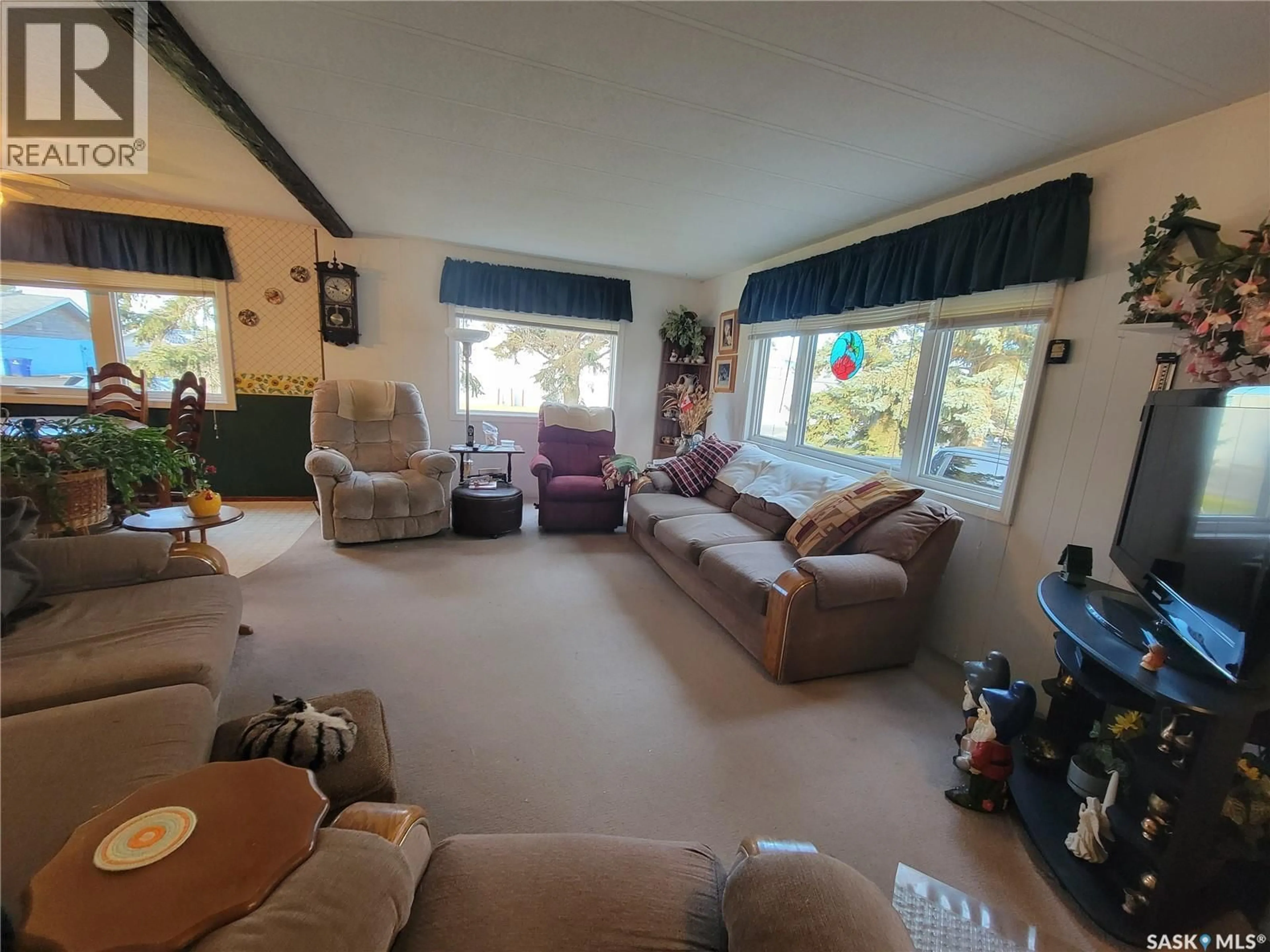 Living room with furniture, unknown for 310 5TH STREET, Wilkie Saskatchewan S0L2C0