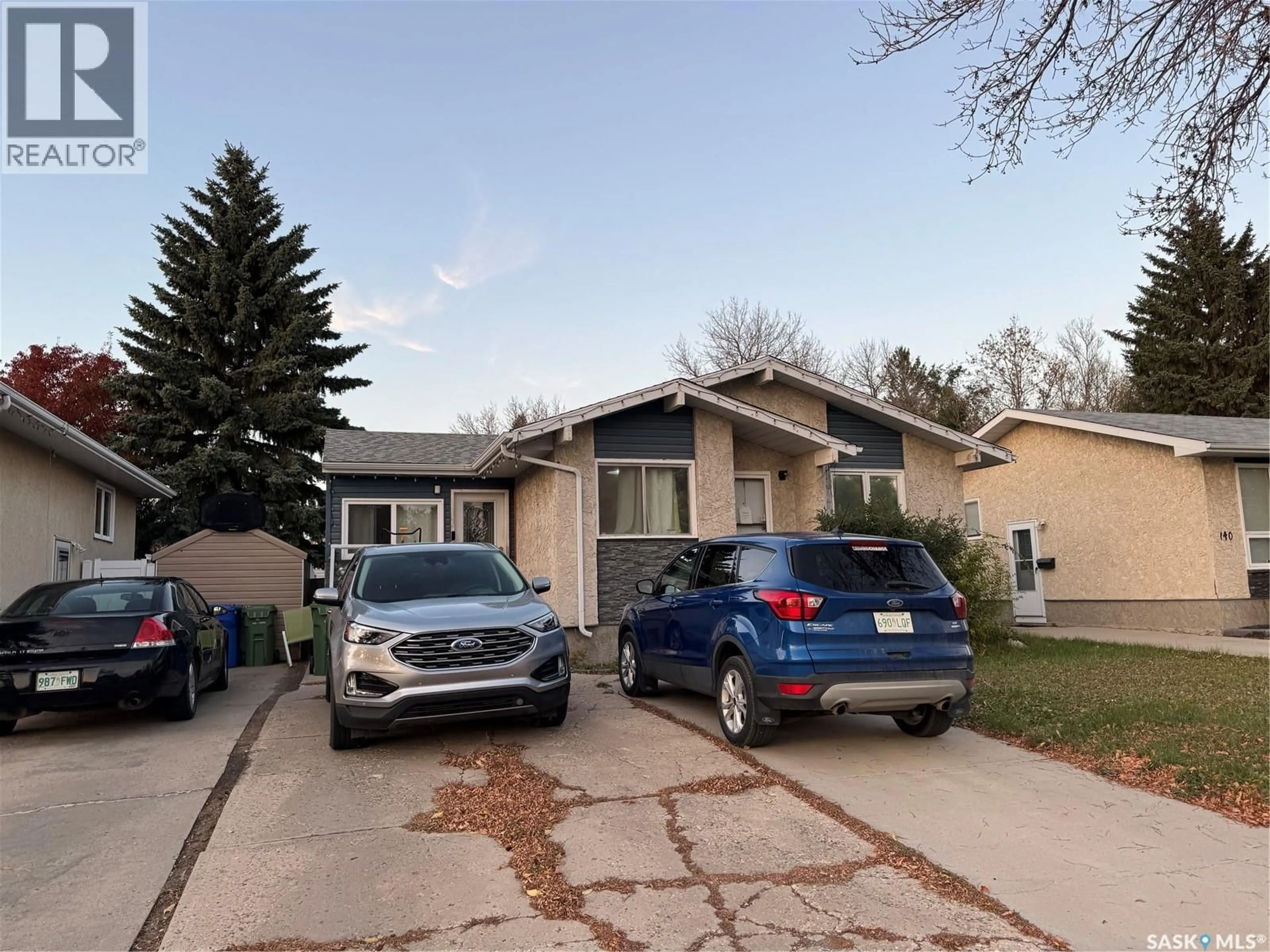 A pic from outside/outdoor area/front of a property/back of a property/a pic from drone, street for 138 THOMSON AVENUE, Regina Saskatchewan S4N5L3